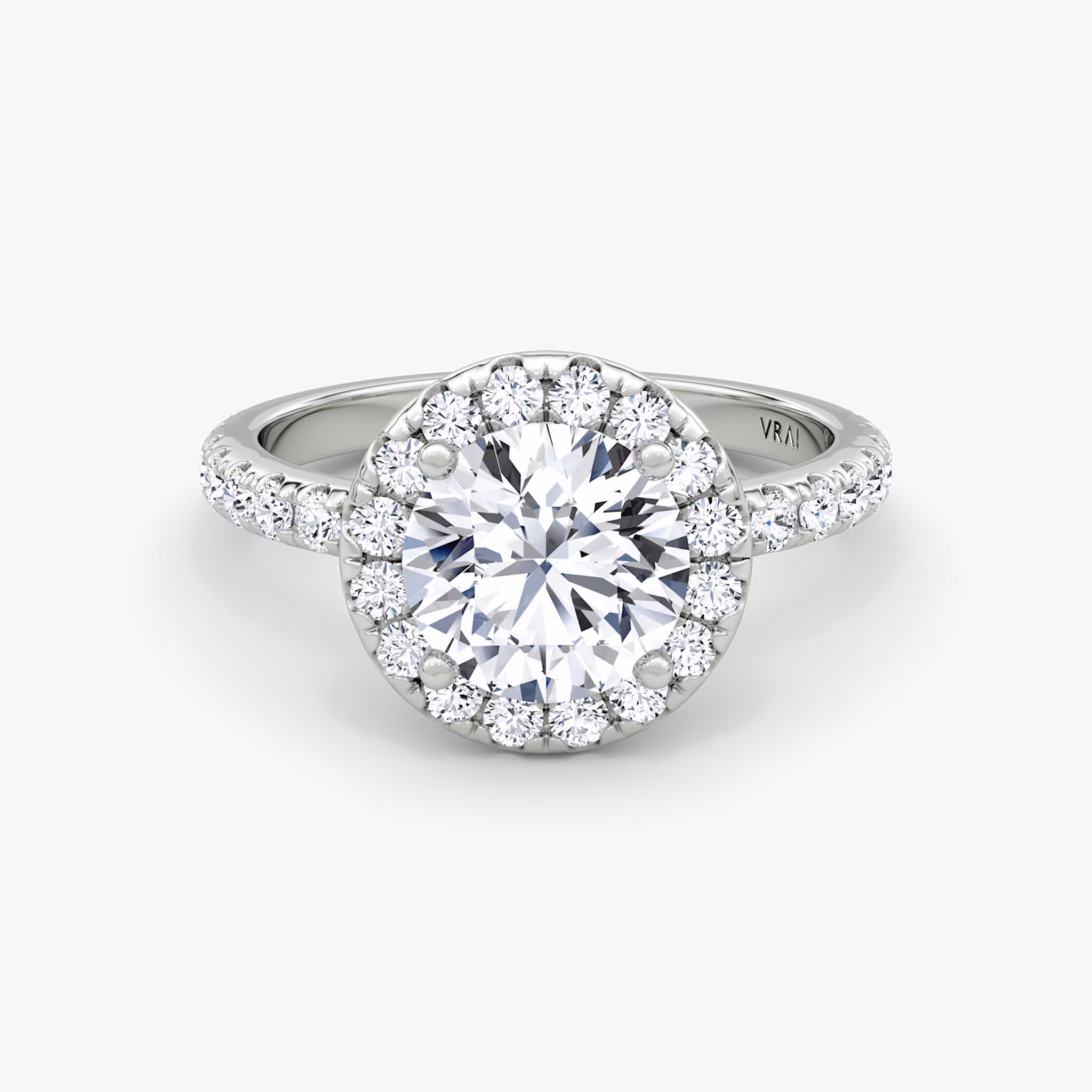 The Halo | Round Brilliant | Platinum | bandAccent: Pavé | caratWeight: 1.5ct | haloSize: large | diamondOrientation: vertical