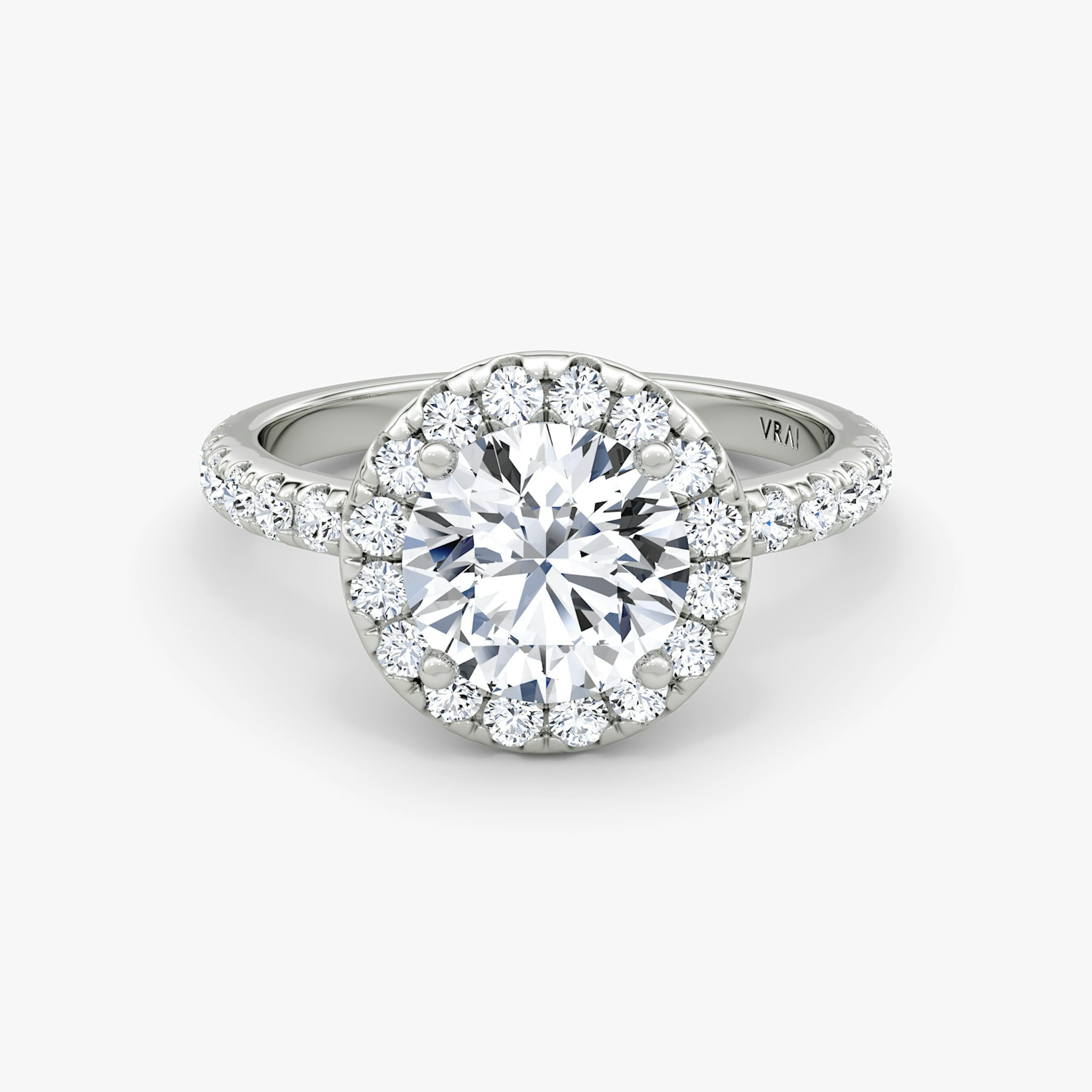 The Halo | Round Brilliant | Platinum | bandAccent: Pavé | caratWeight: 1.5ct | haloSize: large | diamondOrientation: vertical