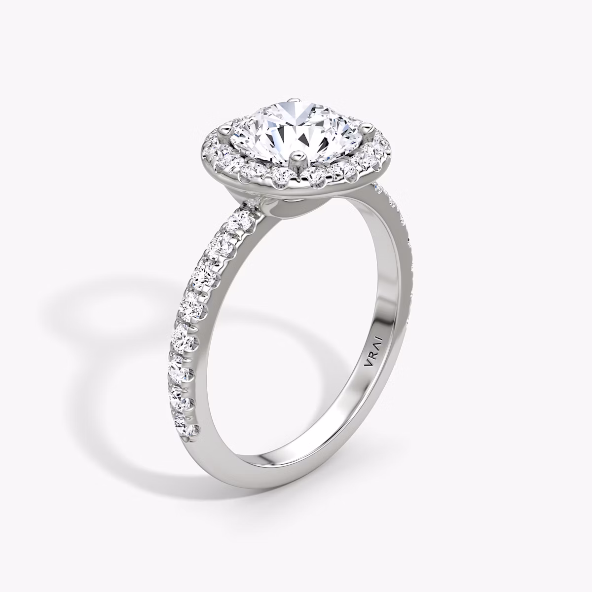 The Halo | Round Brilliant | Platinum | bandAccent: Pavé | caratWeight: 2.0ct | haloSize: large | diamondOrientation: vertical