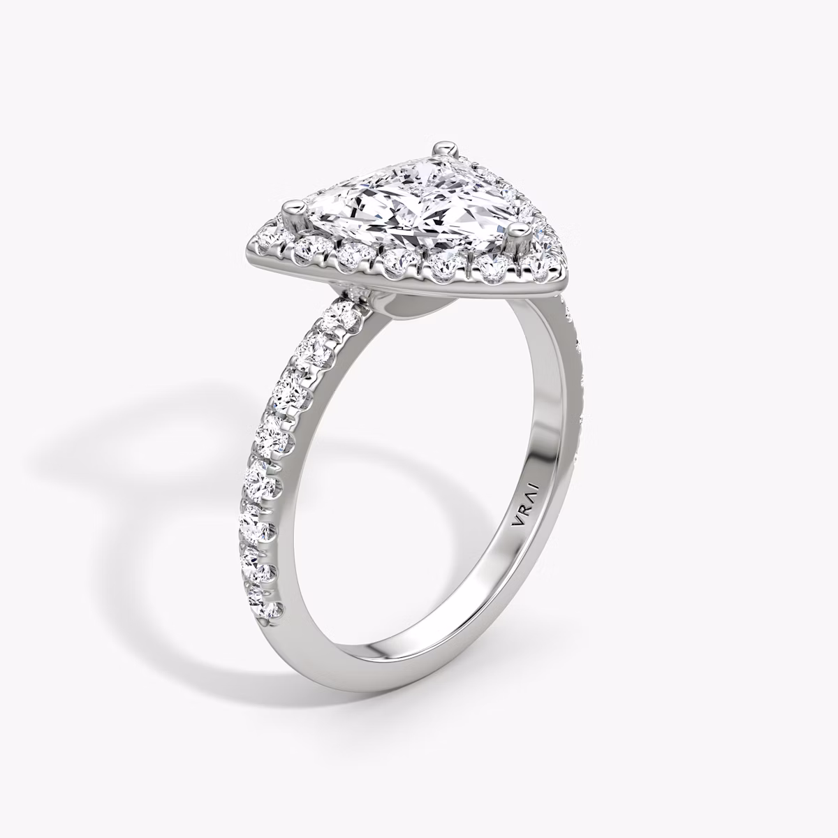 The Halo | Trillion | Platinum | bandAccent: Pavé | haloSize: large | diamondOrientation: vertical | caratWeight: other