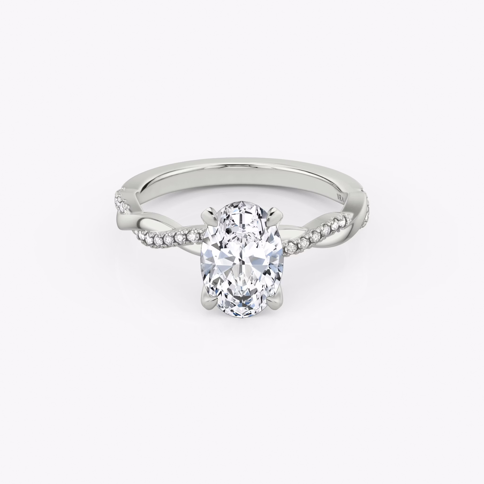 The Twisted Classic | Oval | Platinum | bandAccent: Pavé | diamondOrientation: vertical | caratWeight: other