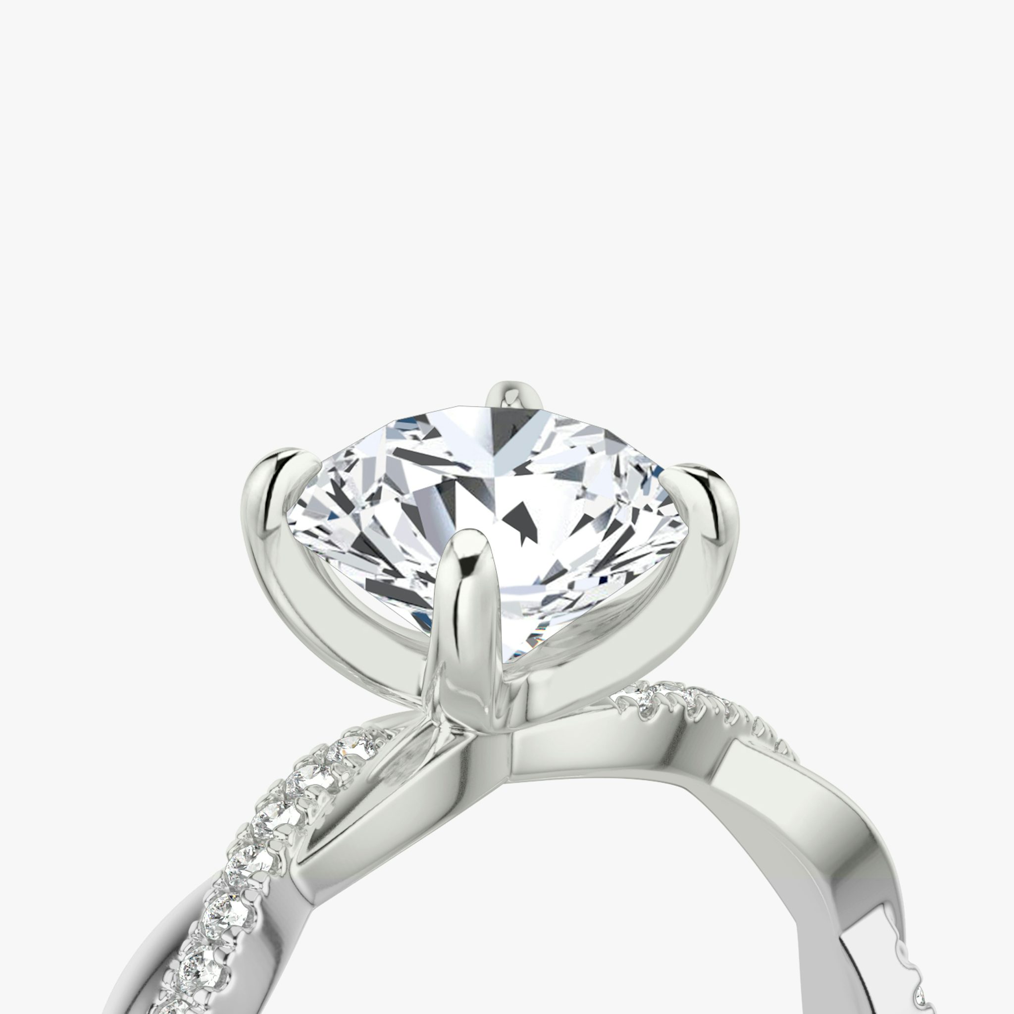 The Twisted Classic | Round Brilliant | 18k | White Gold | bandAccent: Pavé | caratWeight: other | diamondOrientation: vertical