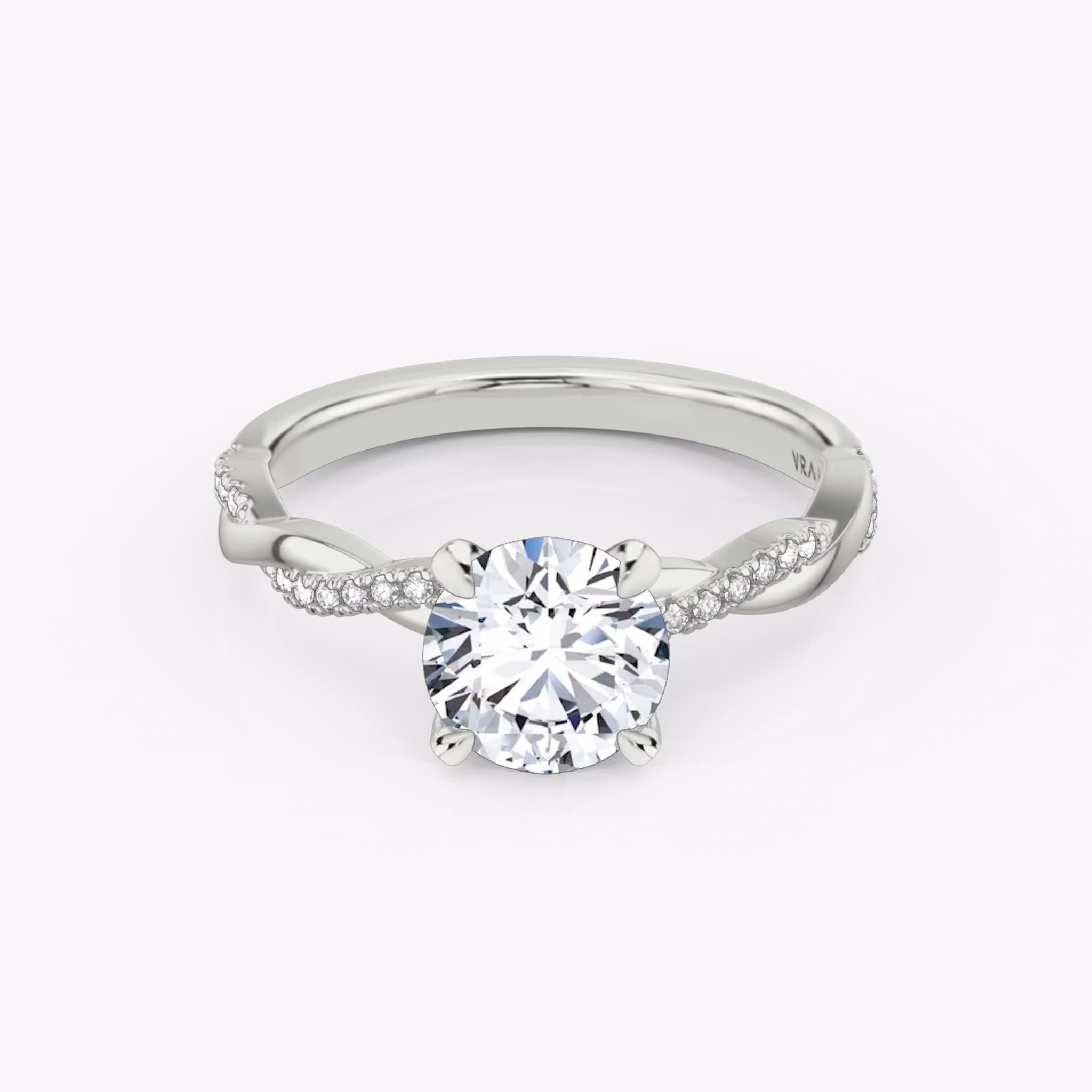 The Twisted Classic | Round Brilliant | 18k | White Gold | bandAccent: Pavé | caratWeight: other | diamondOrientation: vertical