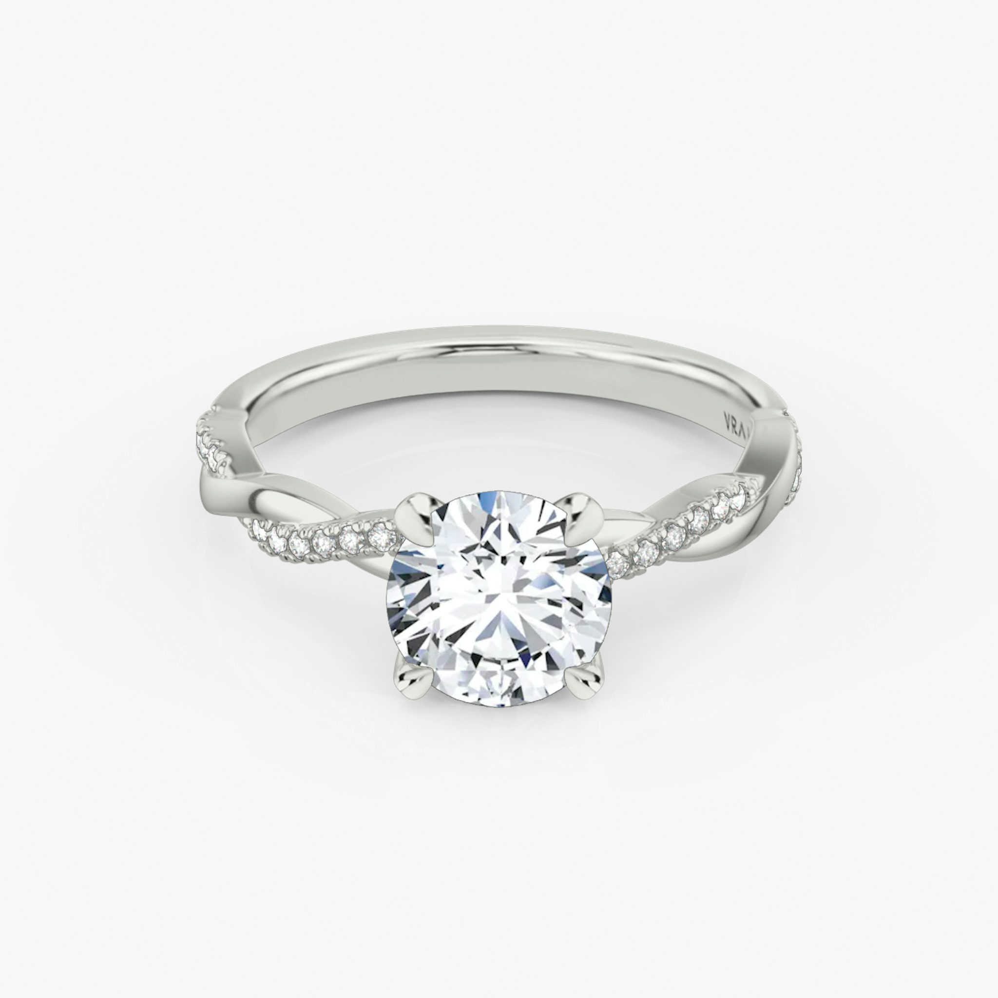 The Twisted Classic | Round Brilliant | 18k | White Gold | bandAccent: Pavé | caratWeight: other | diamondOrientation: vertical
