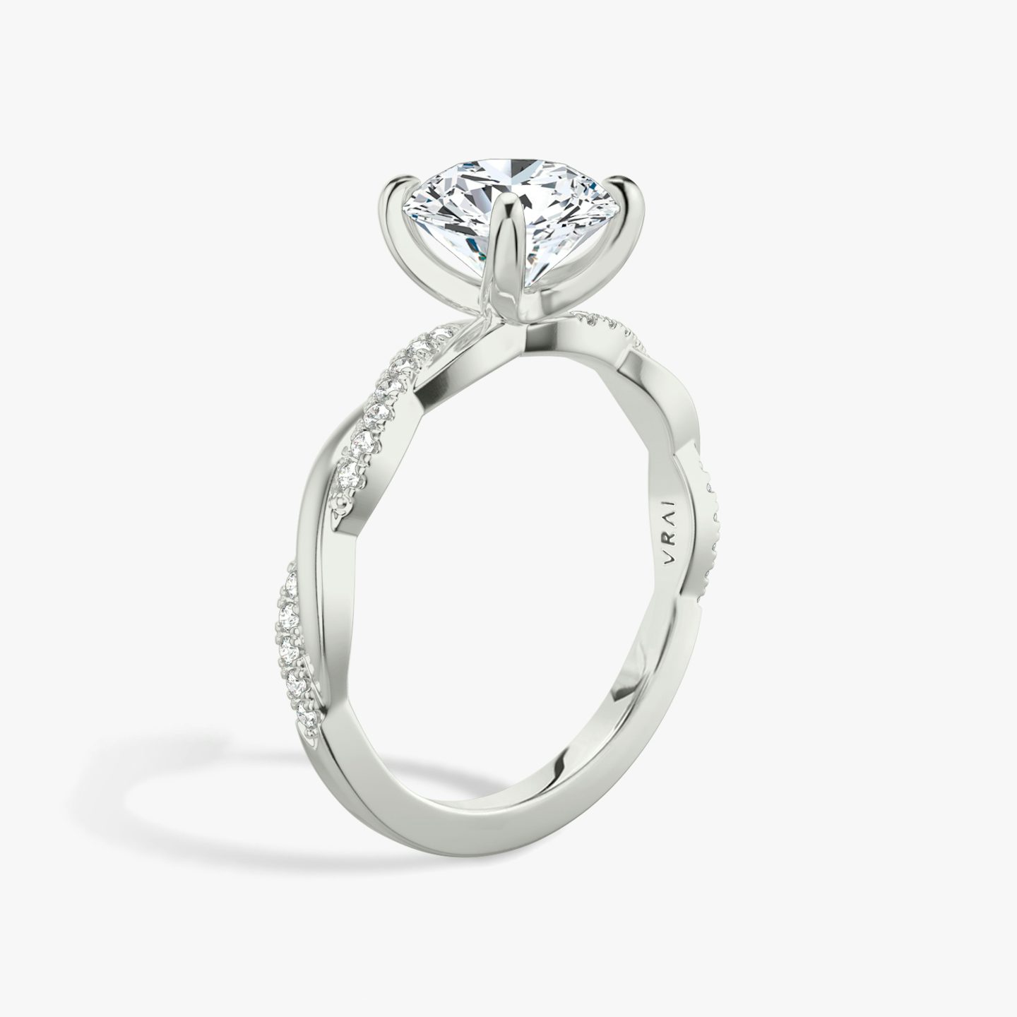 The Twisted Classic | Round Brilliant | Platinum | bandAccent: Pavé | caratWeight: 2.0ct | diamondOrientation: vertical