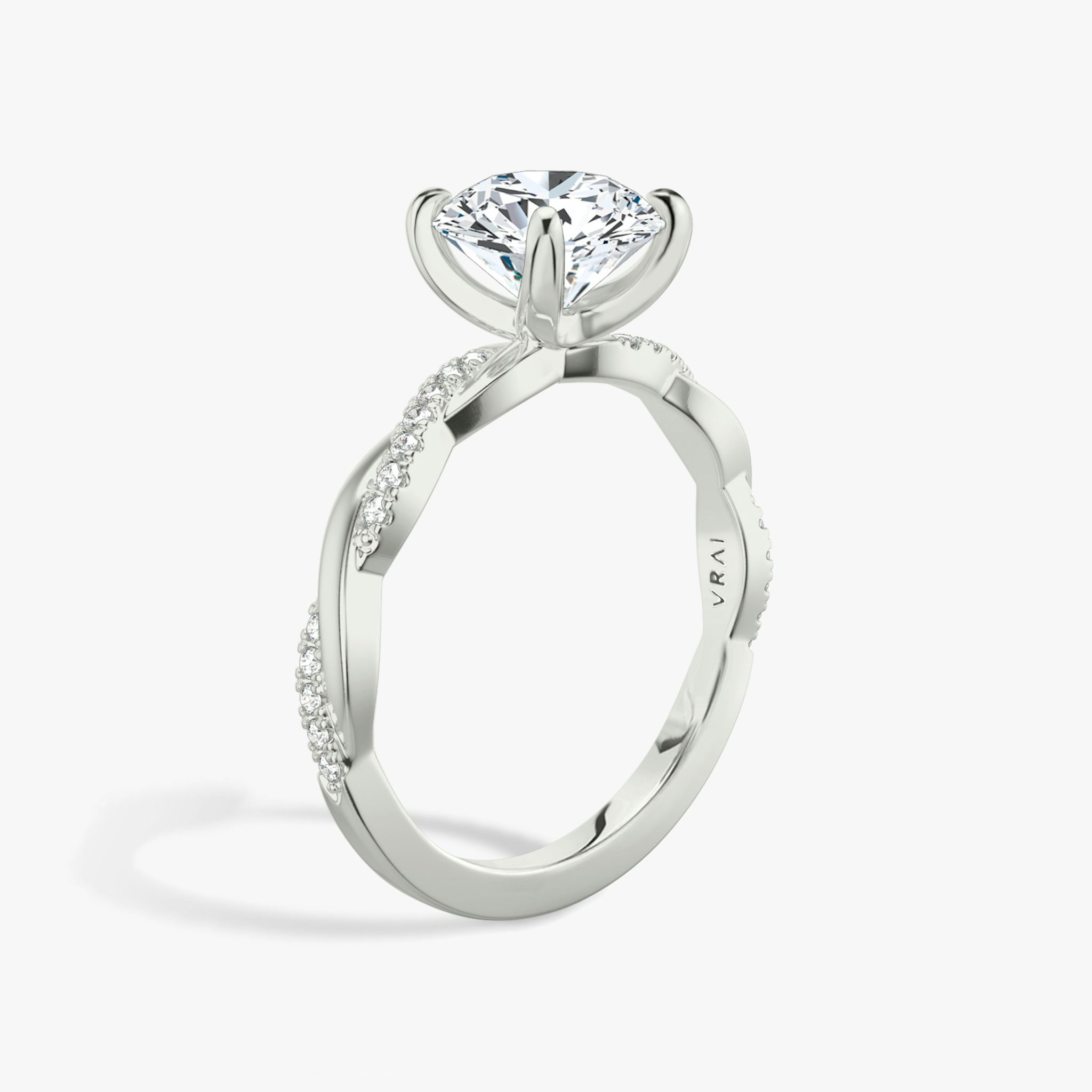 The Twisted Classic | Round Brilliant | 18k | White Gold | bandAccent: Pavé | caratWeight: other | diamondOrientation: vertical
