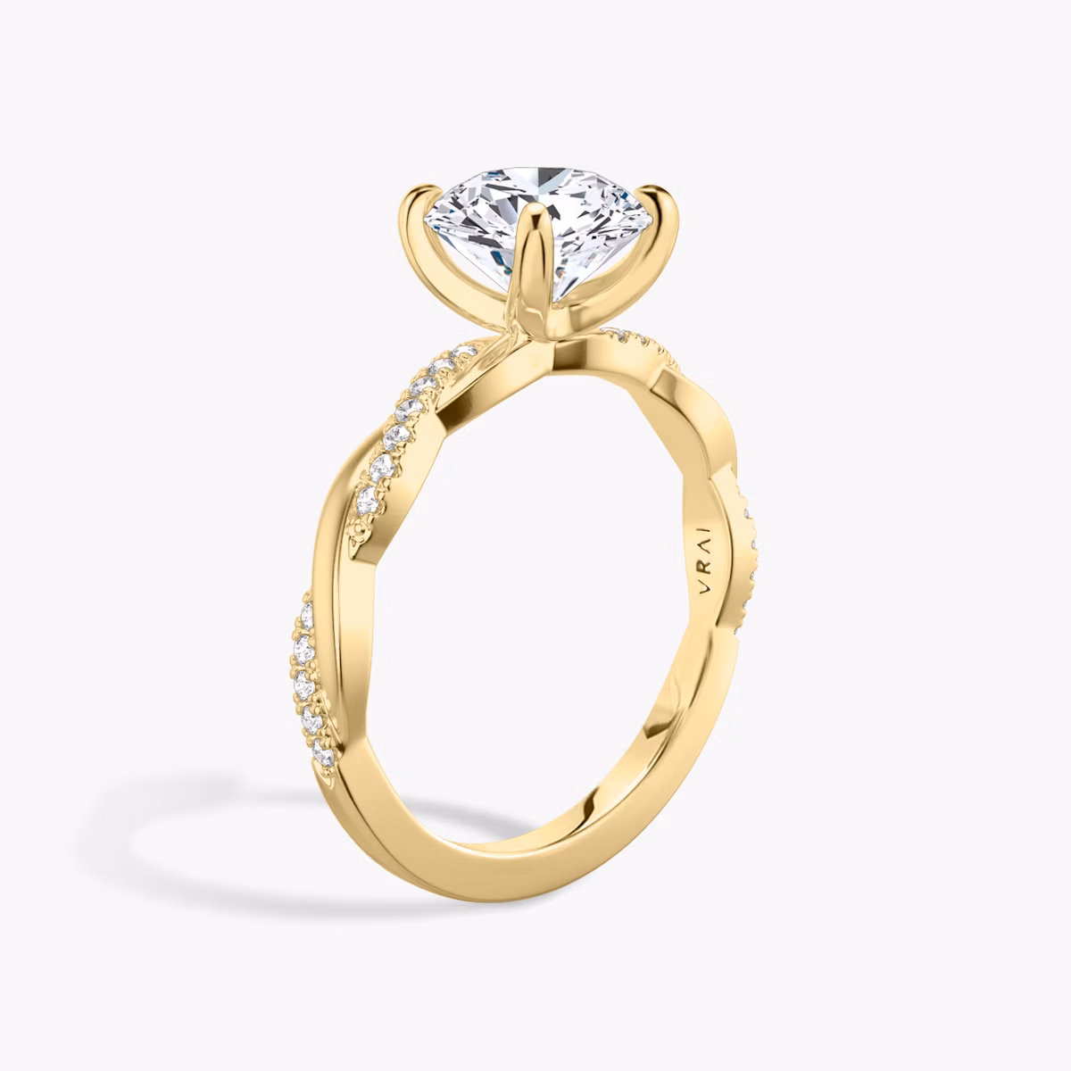 The Twisted Classic | Round Brilliant | 18k | Yellow Gold | bandAccent: Pavé | caratWeight: 1.0ct | diamondOrientation: vertical
