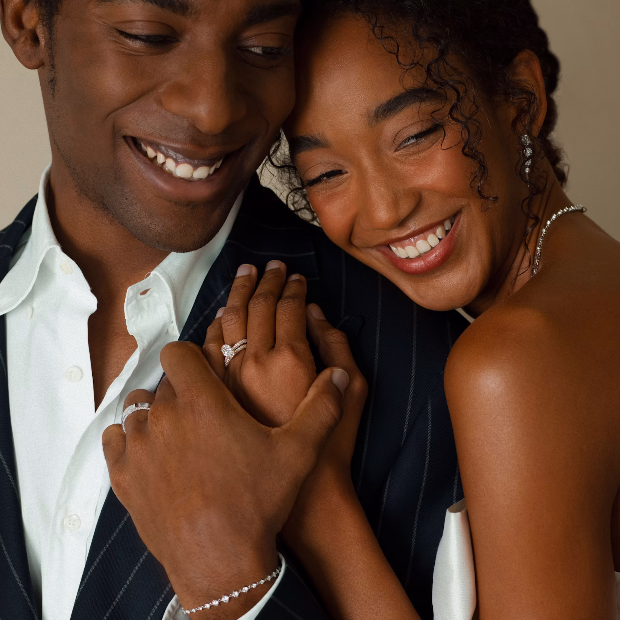 Yellow gold wedding band with pave diamond border, shown on a product page to highlight fine wedding jewelry design.