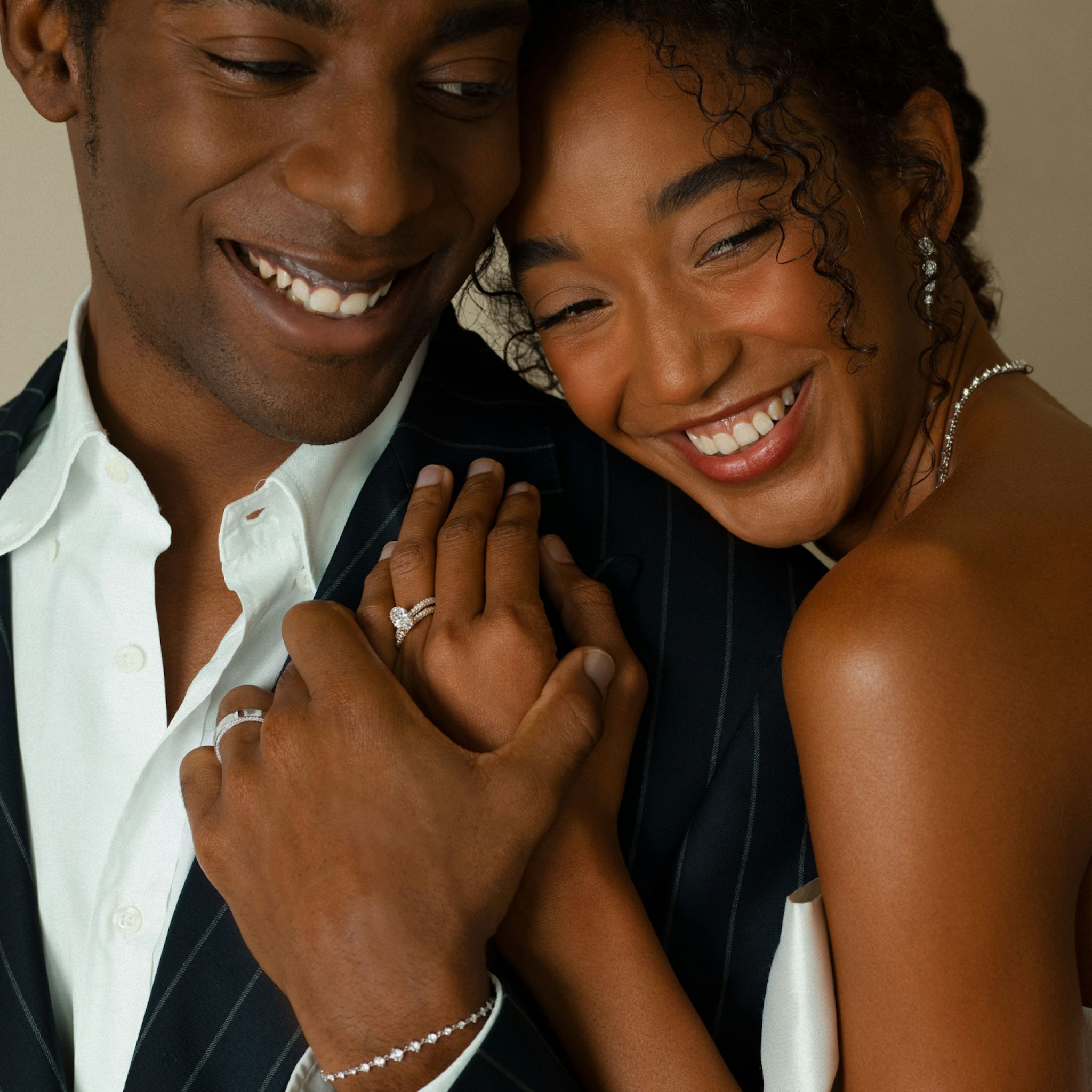 Yellow gold wedding band with pave diamond border, shown on a product page to highlight fine wedding jewelry design.