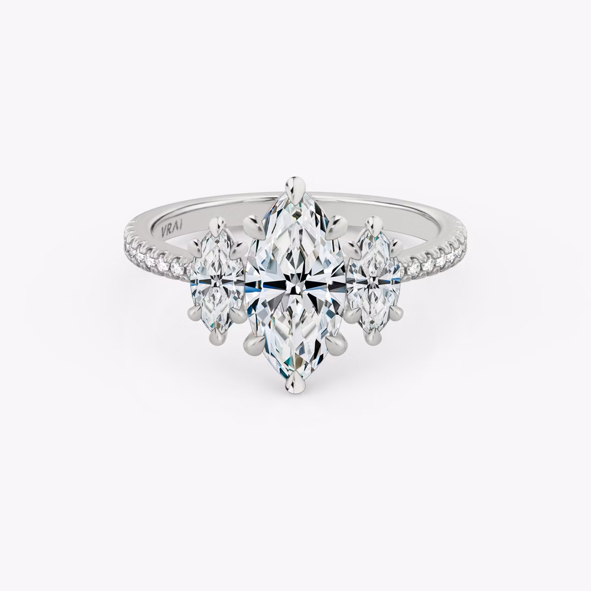 The Three Stone | Marquise | 18k | White Gold | bandAccent: Pavé | sideStoneCarat: 0.25ct | sideStoneShape: Marquise | diamondOrientation: vertical | caratWeight: other
