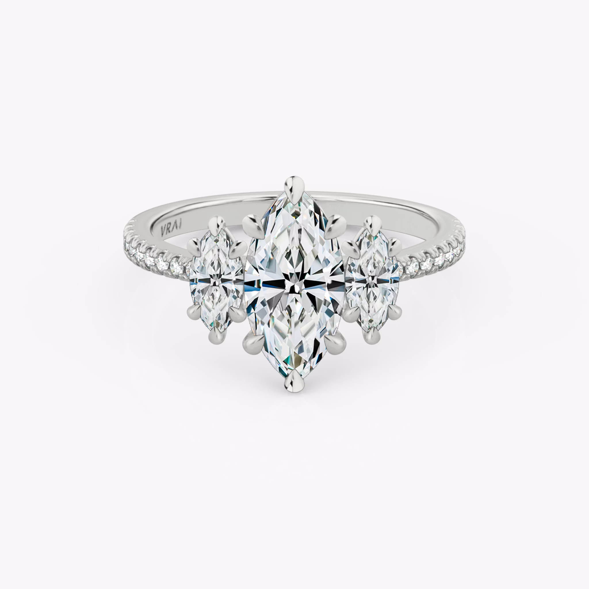 The Three Stone | Marquise | Platinum | bandAccent: Pavé | sideStoneCarat: 0.25ct | sideStoneShape: Marquise | diamondOrientation: vertical | caratWeight: other
