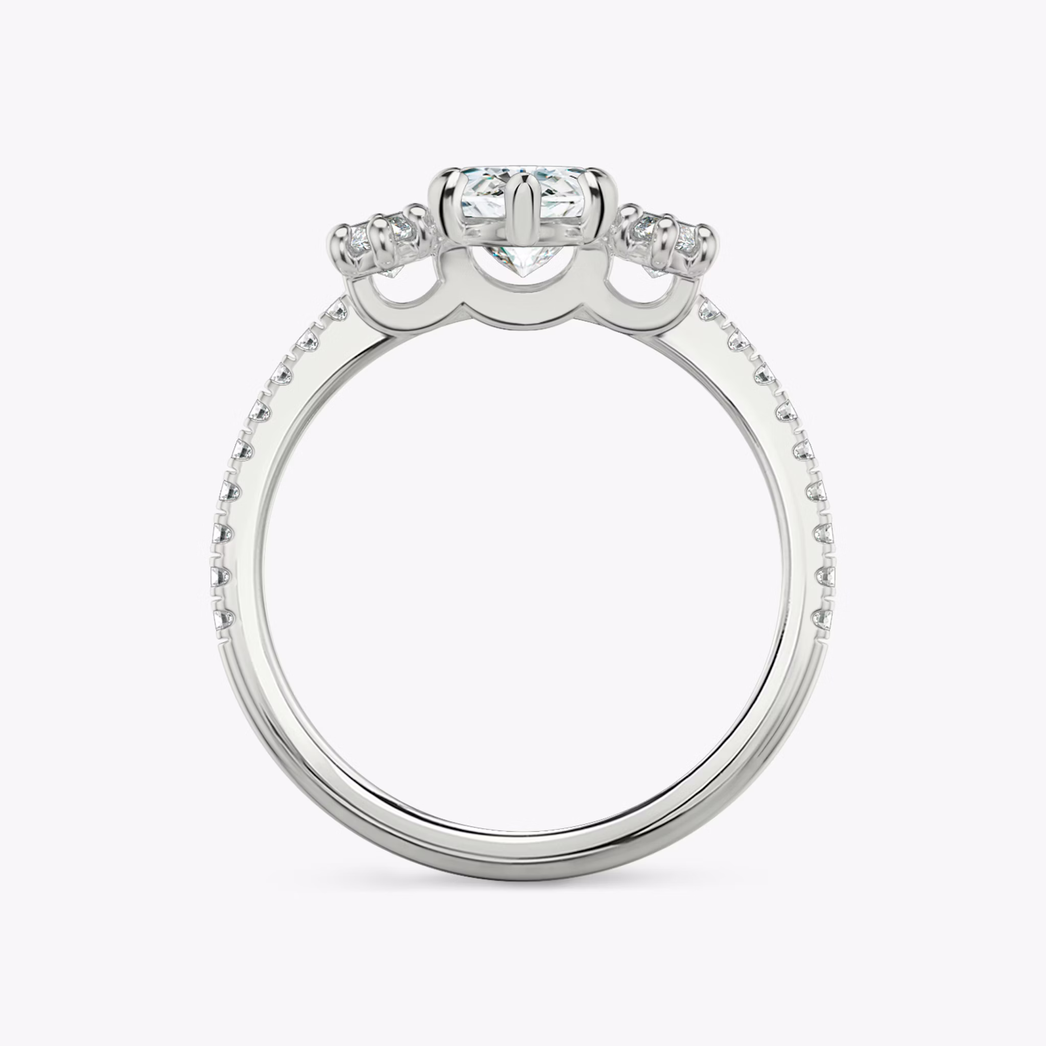 The Three Stone | Marquise | Platinum | bandAccent: Pavé | sideStoneCarat: 0.25ct | sideStoneShape: Marquise | diamondOrientation: vertical | caratWeight: other