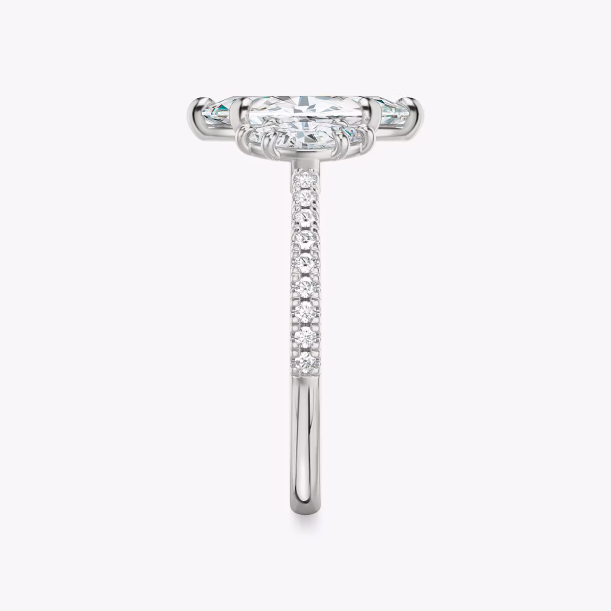 The Three Stone | Marquise | 18k | White Gold | bandAccent: Pavé | sideStoneCarat: 0.25ct | sideStoneShape: Marquise | diamondOrientation: vertical | caratWeight: other