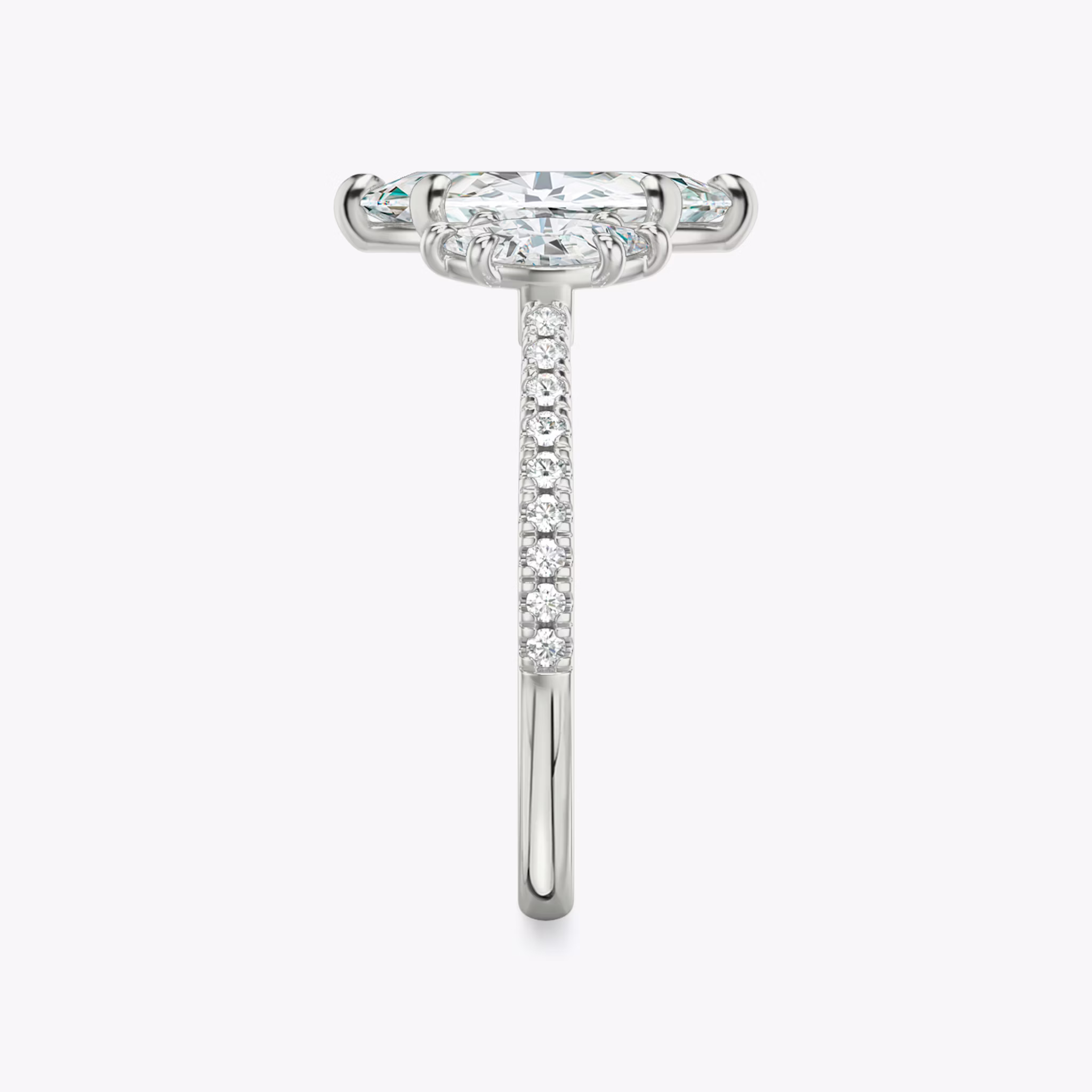 The Three Stone | Marquise | Platinum | bandAccent: Pavé | sideStoneCarat: 0.25ct | sideStoneShape: Marquise | diamondOrientation: vertical | caratWeight: other