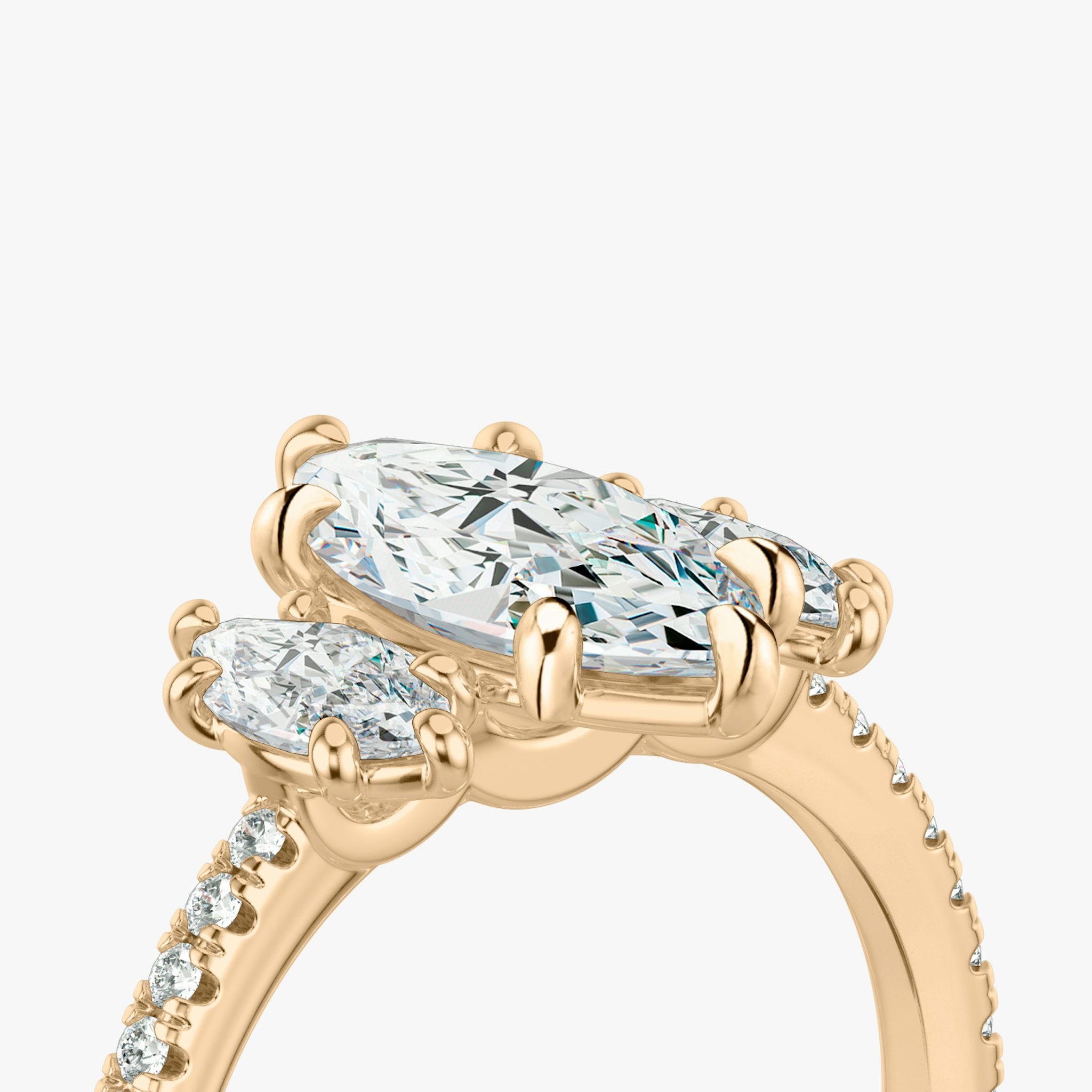 The Three Stone | Marquise | 14k | Rose Gold | bandAccent: Pavé | sideStoneCarat: 0.25ct | sideStoneShape: Marquise | diamondOrientation: vertical | caratWeight: other