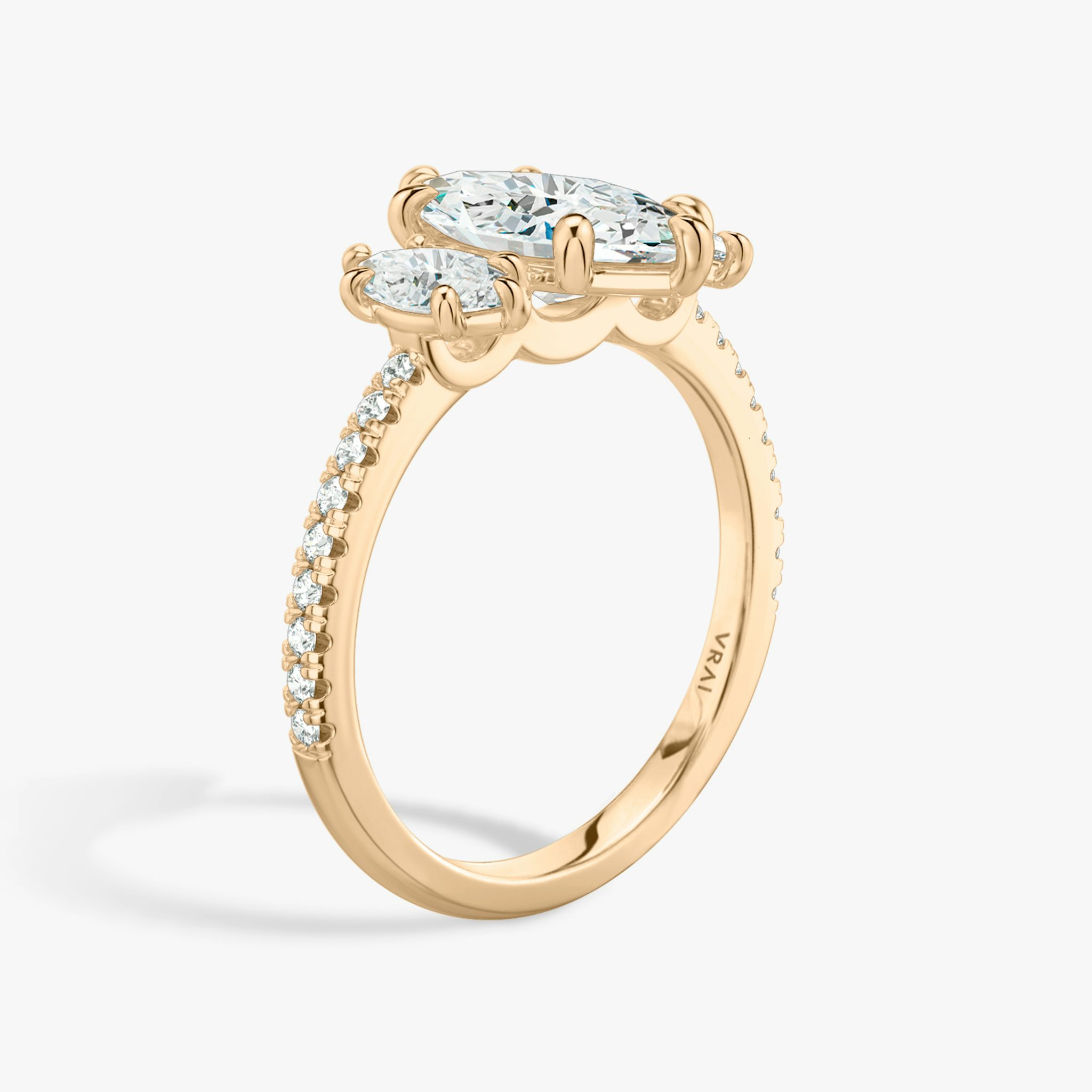 The Three Stone | Marquise | 14k | Rose Gold | bandAccent: Pavé | sideStoneCarat: 0.25ct | sideStoneShape: Marquise | diamondOrientation: vertical | caratWeight: other
