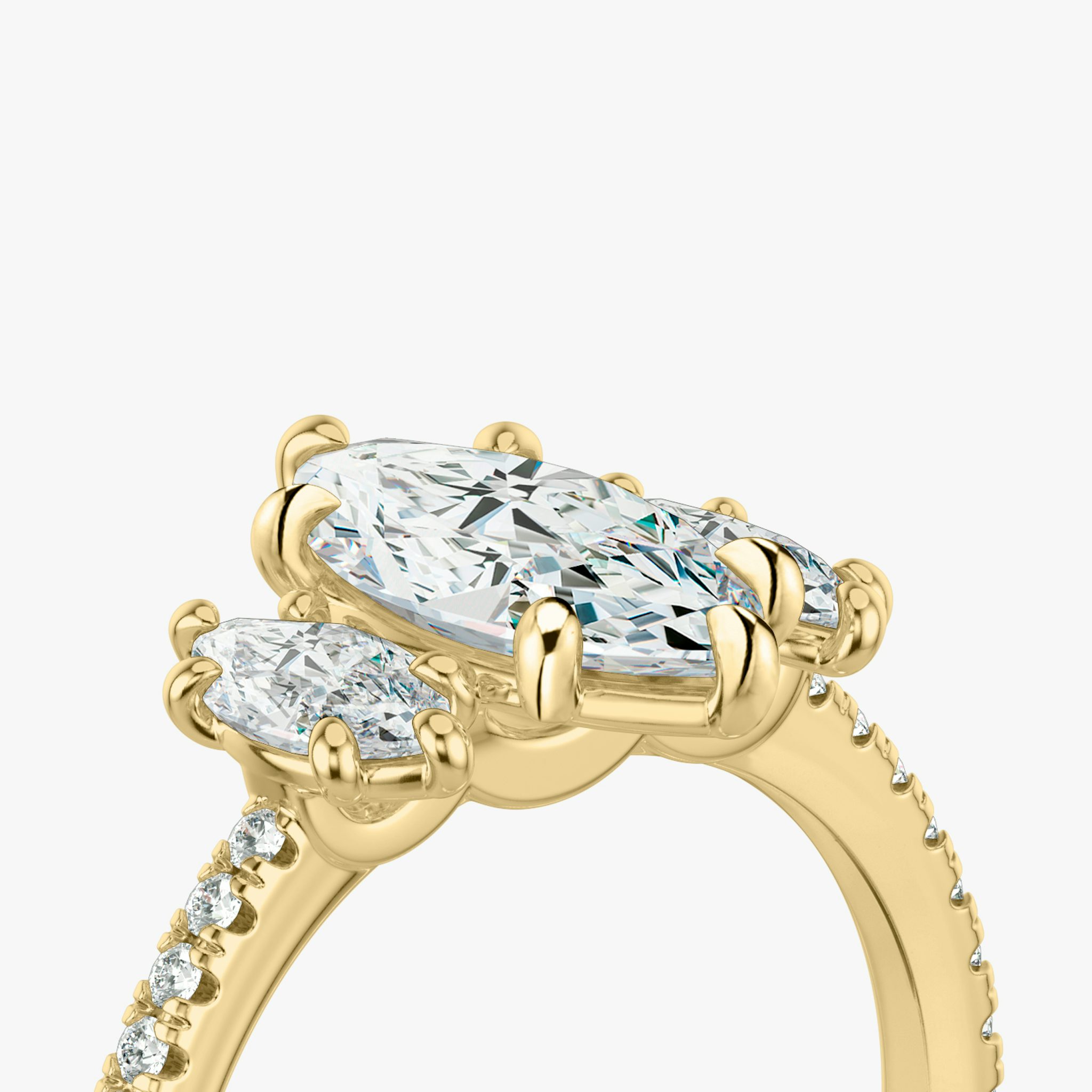 The Three Stone | Marquise | 18k | Yellow Gold | bandAccent: Pavé | sideStoneCarat: 0.25ct | sideStoneShape: Marquise | diamondOrientation: vertical | caratWeight: other