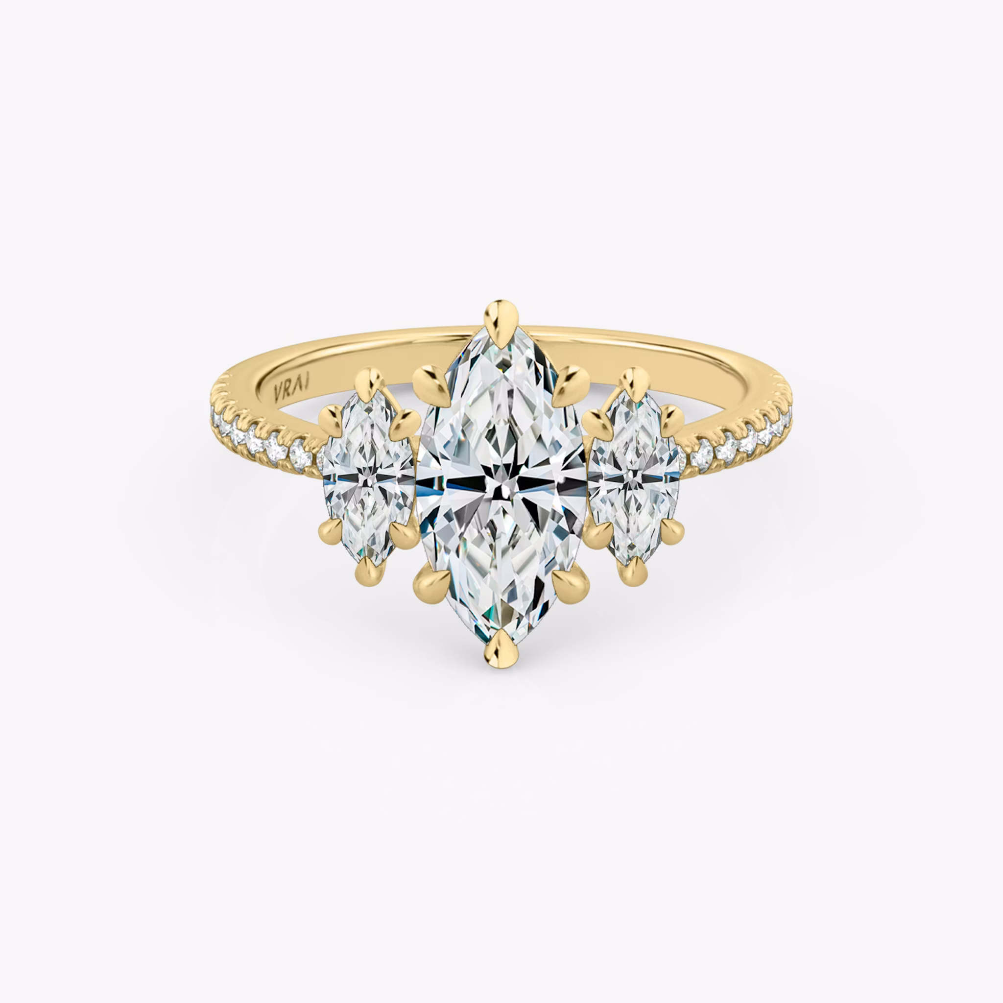 The Three Stone | Marquise | 18k | Yellow Gold | bandAccent: Pavé | sideStoneCarat: 0.25ct | sideStoneShape: Marquise | diamondOrientation: vertical | caratWeight: other