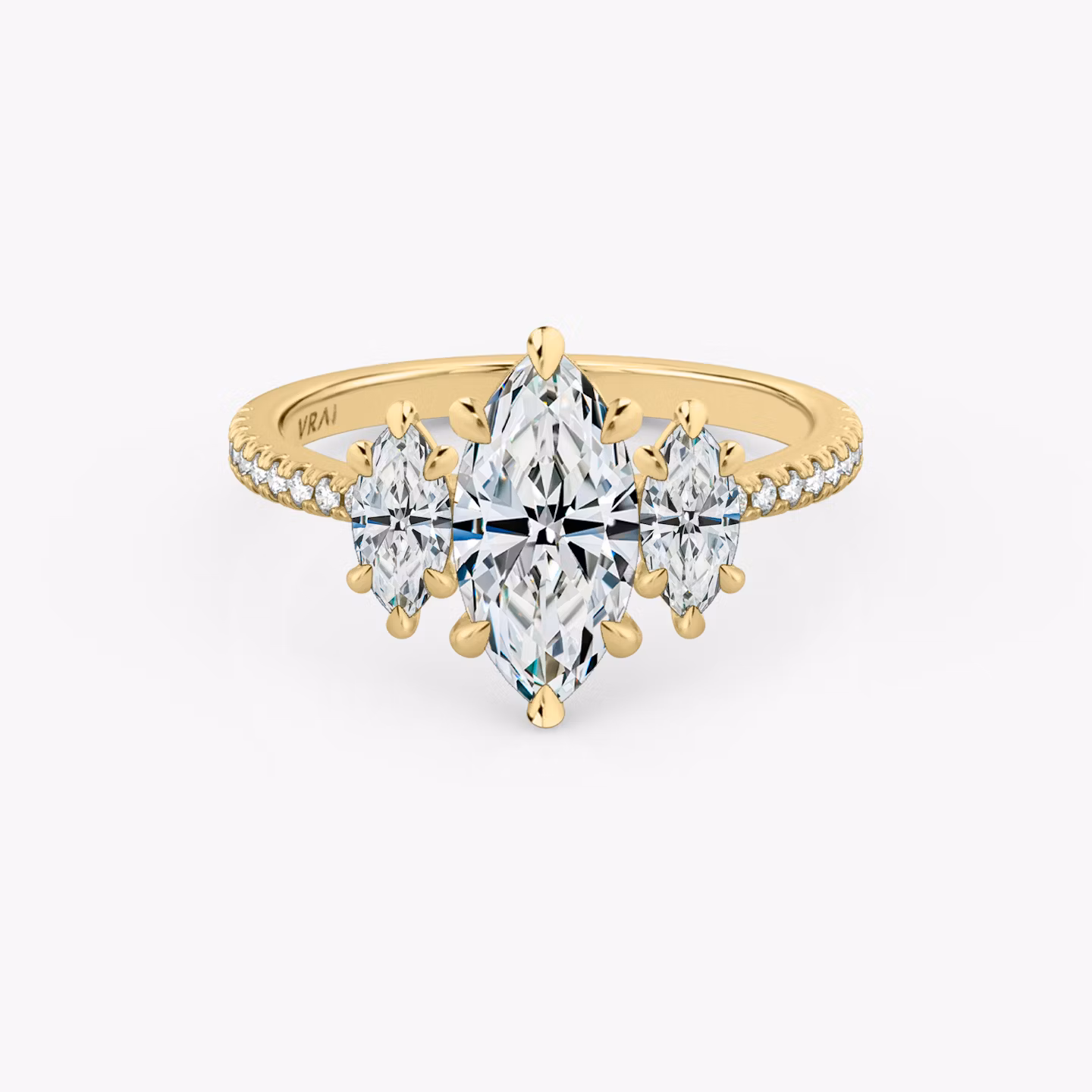 The Three Stone | Marquise | 18k | Yellow Gold | bandAccent: Pavé | sideStoneCarat: 0.25ct | sideStoneShape: Marquise | diamondOrientation: vertical | caratWeight: other