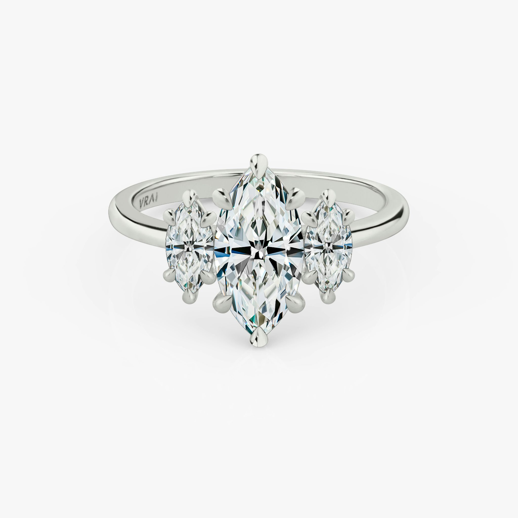 The Three Stone | Marquise | 18k | White Gold | bandAccent: Plain | sideStoneCarat: 0.25ct | sideStoneShape: Marquise | diamondOrientation: vertical | caratWeight: other