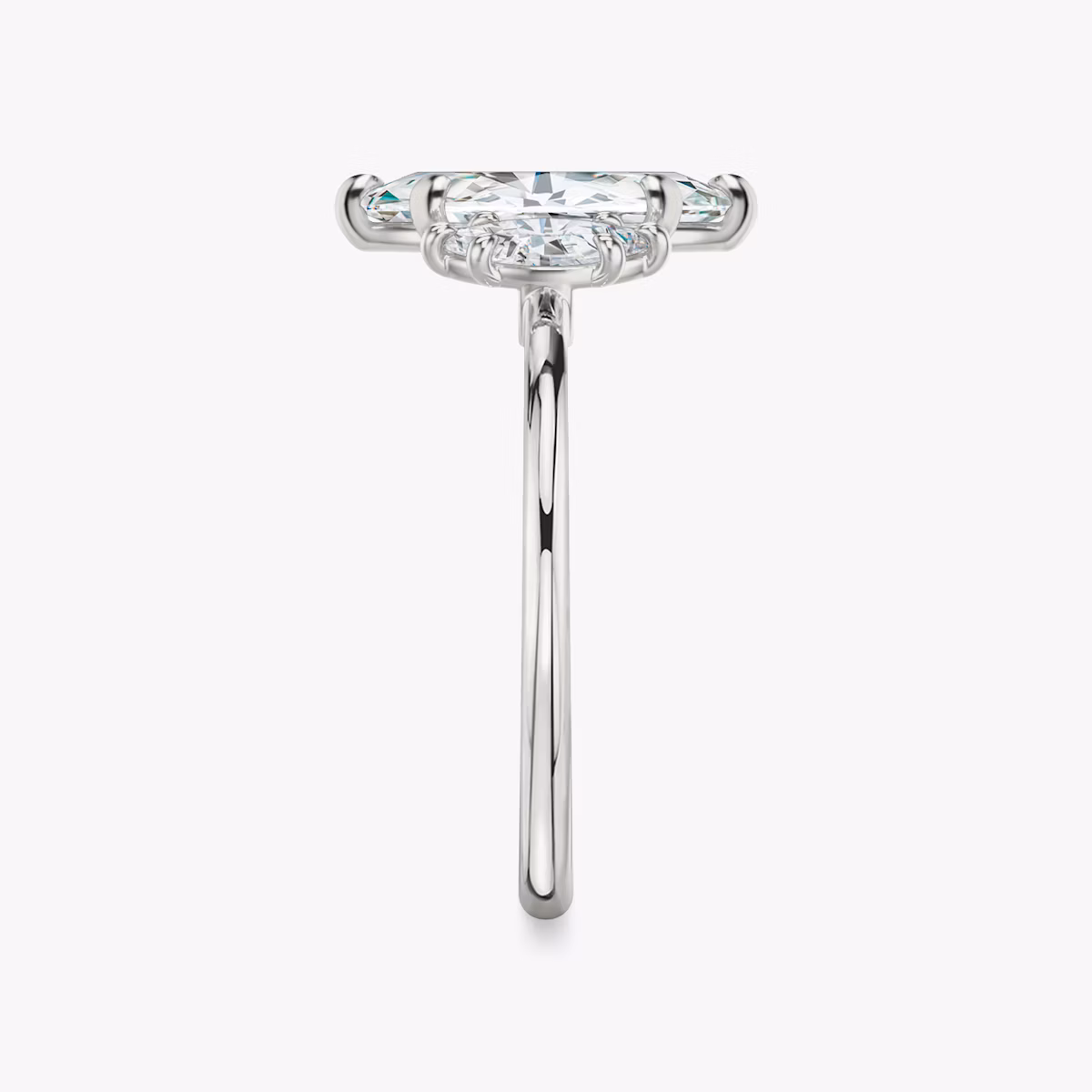 The Three Stone | Marquise | Platinum | bandAccent: Plain | sideStoneCarat: 0.25ct | sideStoneShape: Marquise | diamondOrientation: vertical | caratWeight: other