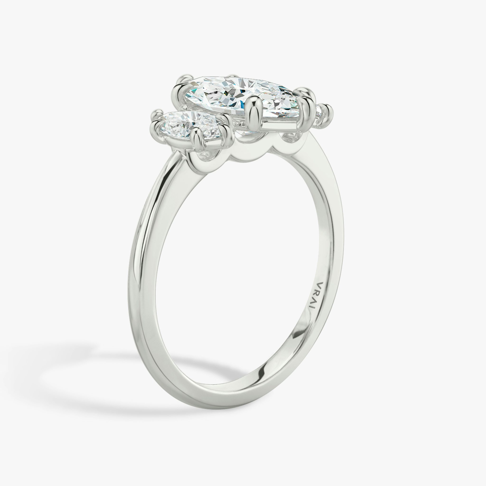The Three Stone | Marquise | 18k | White Gold | bandAccent: Plain | sideStoneCarat: 0.25ct | sideStoneShape: Marquise | diamondOrientation: vertical | caratWeight: other