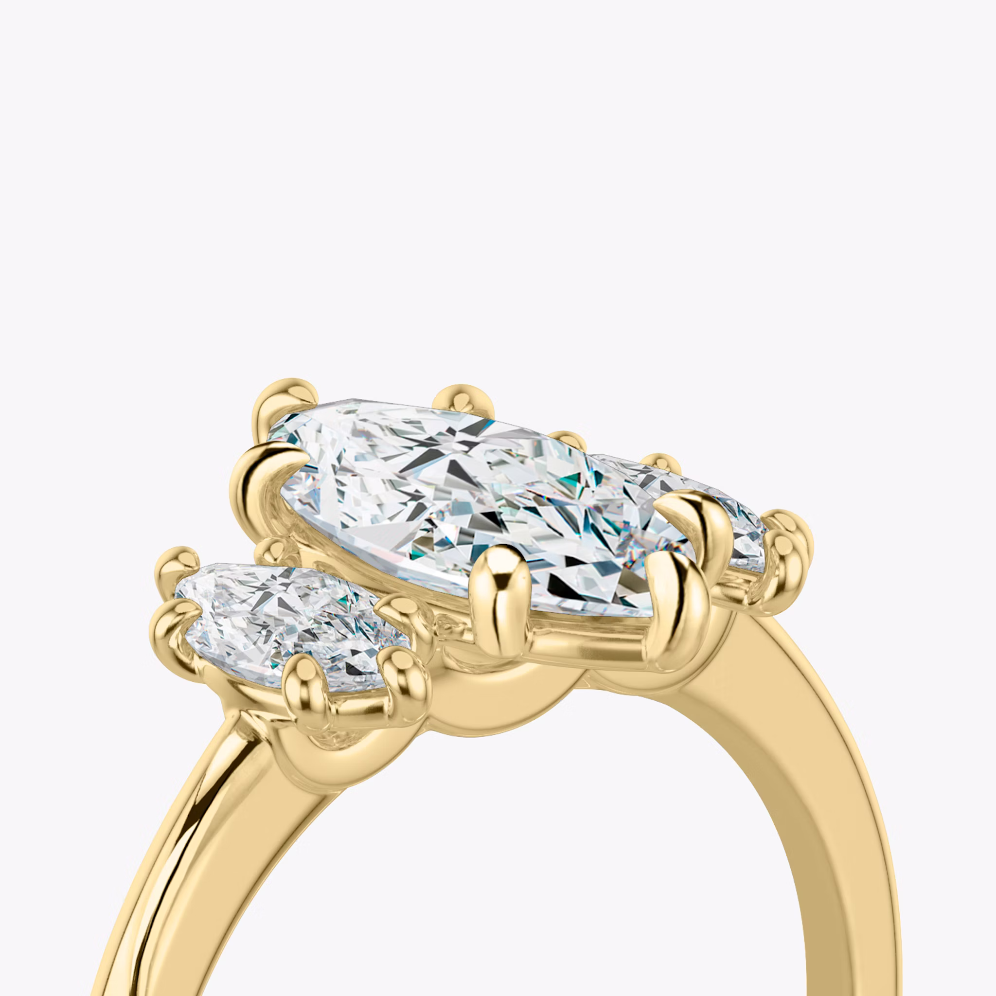 The Three Stone | Marquise | 18k | Yellow Gold | bandAccent: Plain | sideStoneCarat: 0.25ct | sideStoneShape: Marquise | diamondOrientation: vertical | caratWeight: other