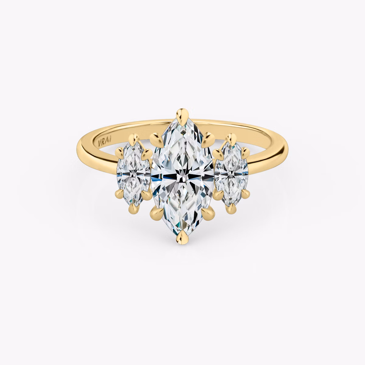 The Three Stone | Marquise | 18k | Yellow Gold | bandAccent: Plain | sideStoneCarat: 0.25ct | sideStoneShape: Marquise | diamondOrientation: vertical | caratWeight: other