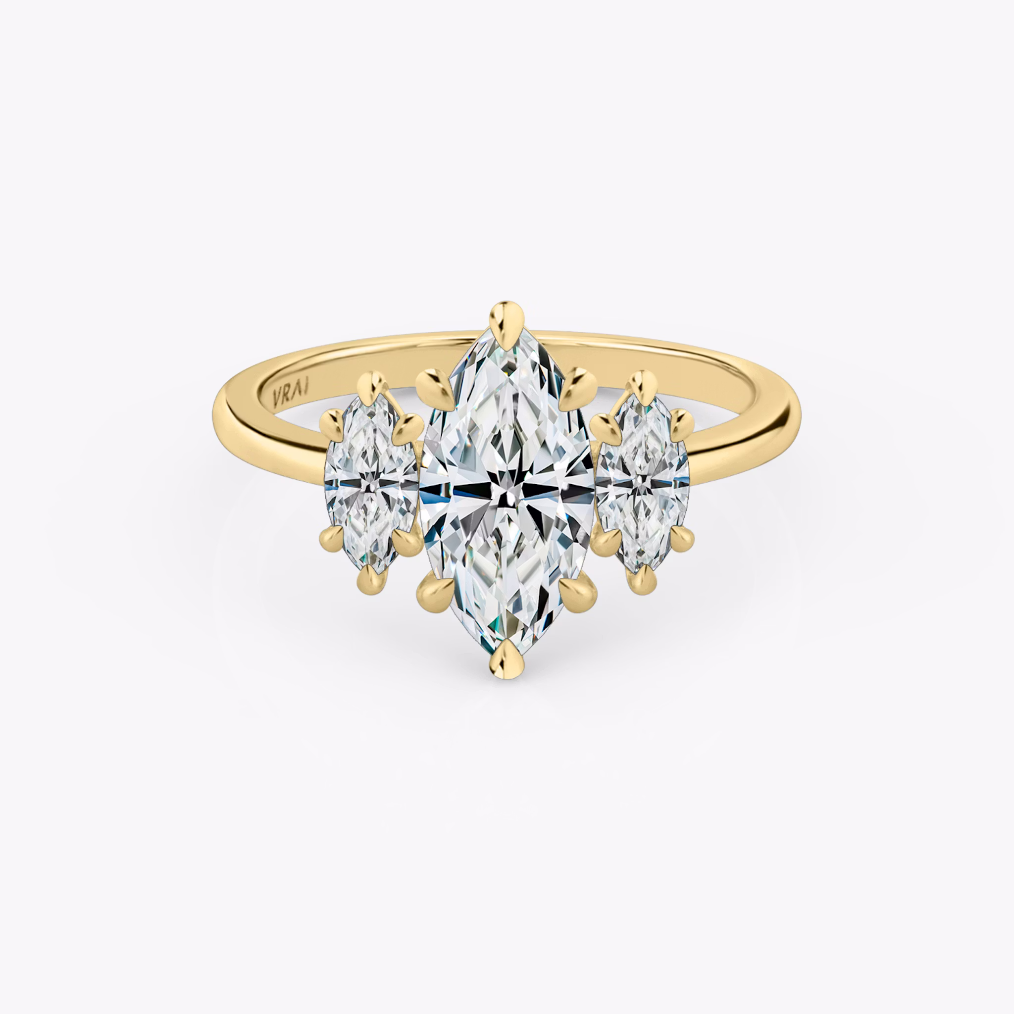 The Three Stone | Marquise | 18k | Yellow Gold | bandAccent: Plain | sideStoneCarat: 0.25ct | sideStoneShape: Marquise | diamondOrientation: vertical | caratWeight: other