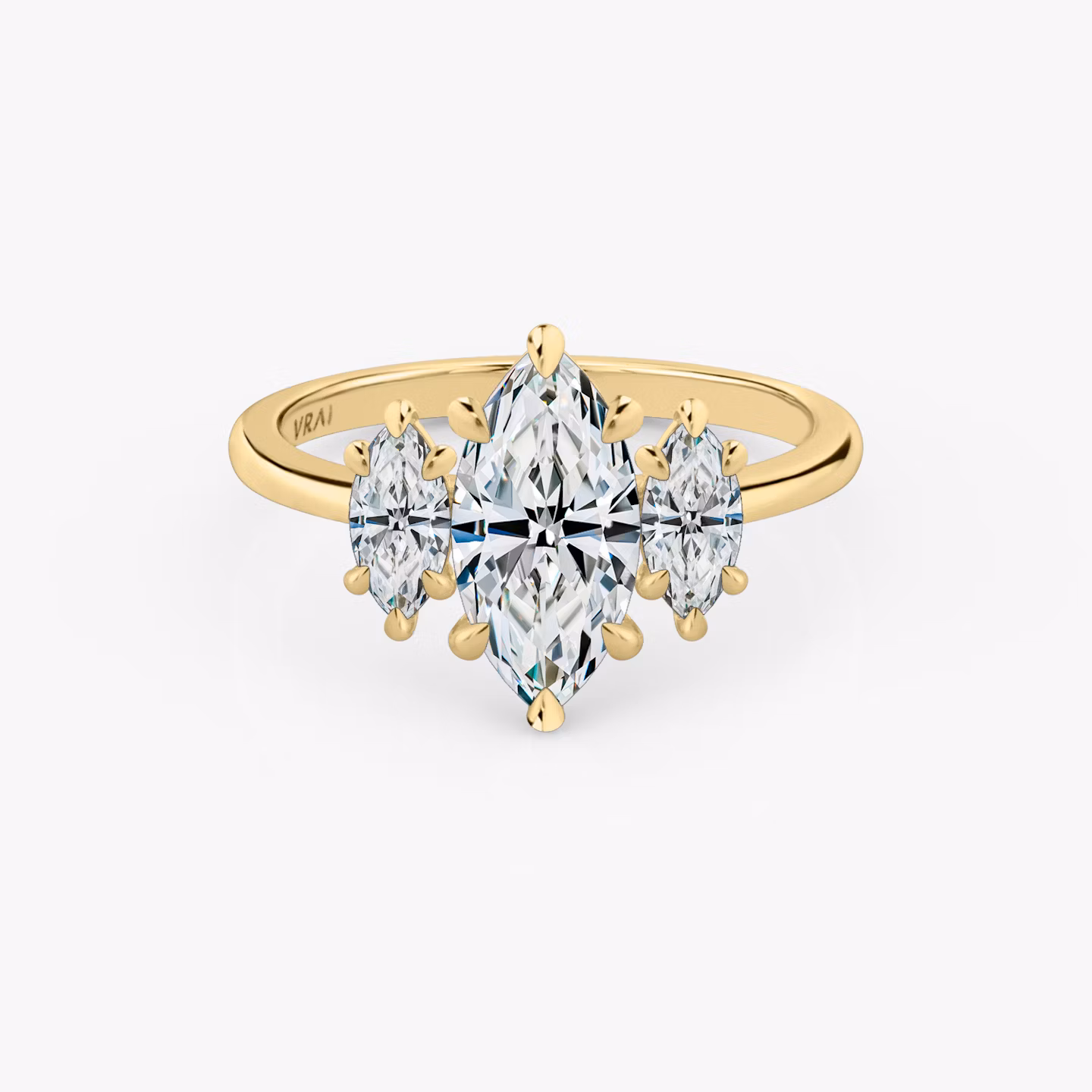 The Three Stone | Marquise | 18k | Yellow Gold | bandAccent: Plain | sideStoneCarat: 0.25ct | sideStoneShape: Marquise | diamondOrientation: vertical | caratWeight: other
