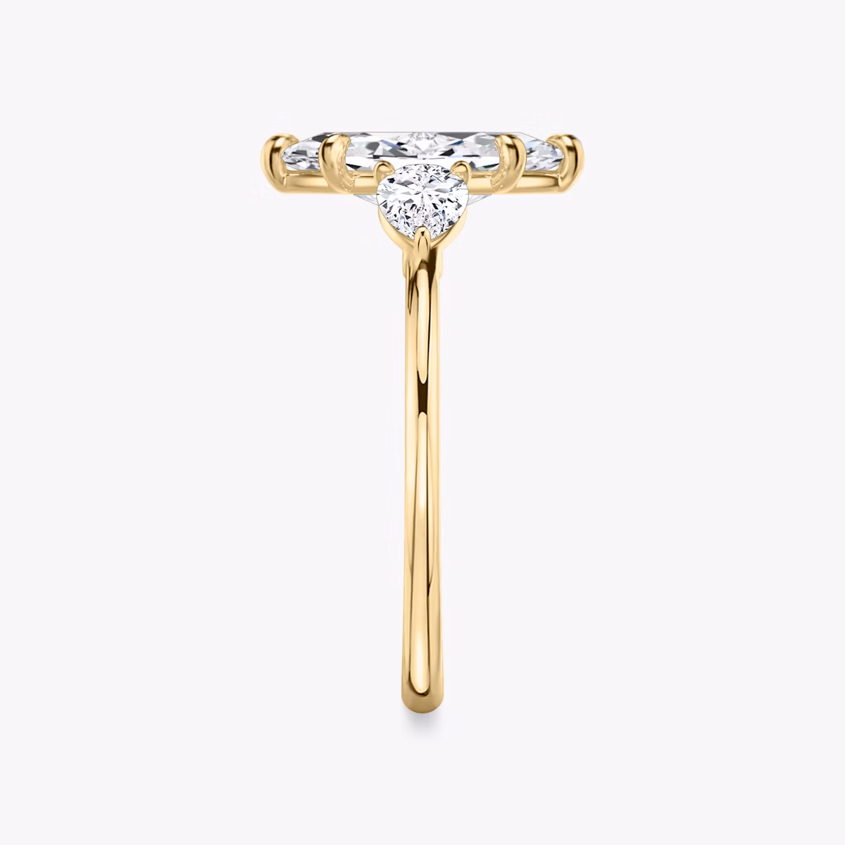 The Three Stone | Marquise | 18k | Yellow Gold | bandAccent: Plain | sideStoneCarat: 0.25ct | sideStoneShape: Pear | diamondOrientation: vertical | caratWeight: other