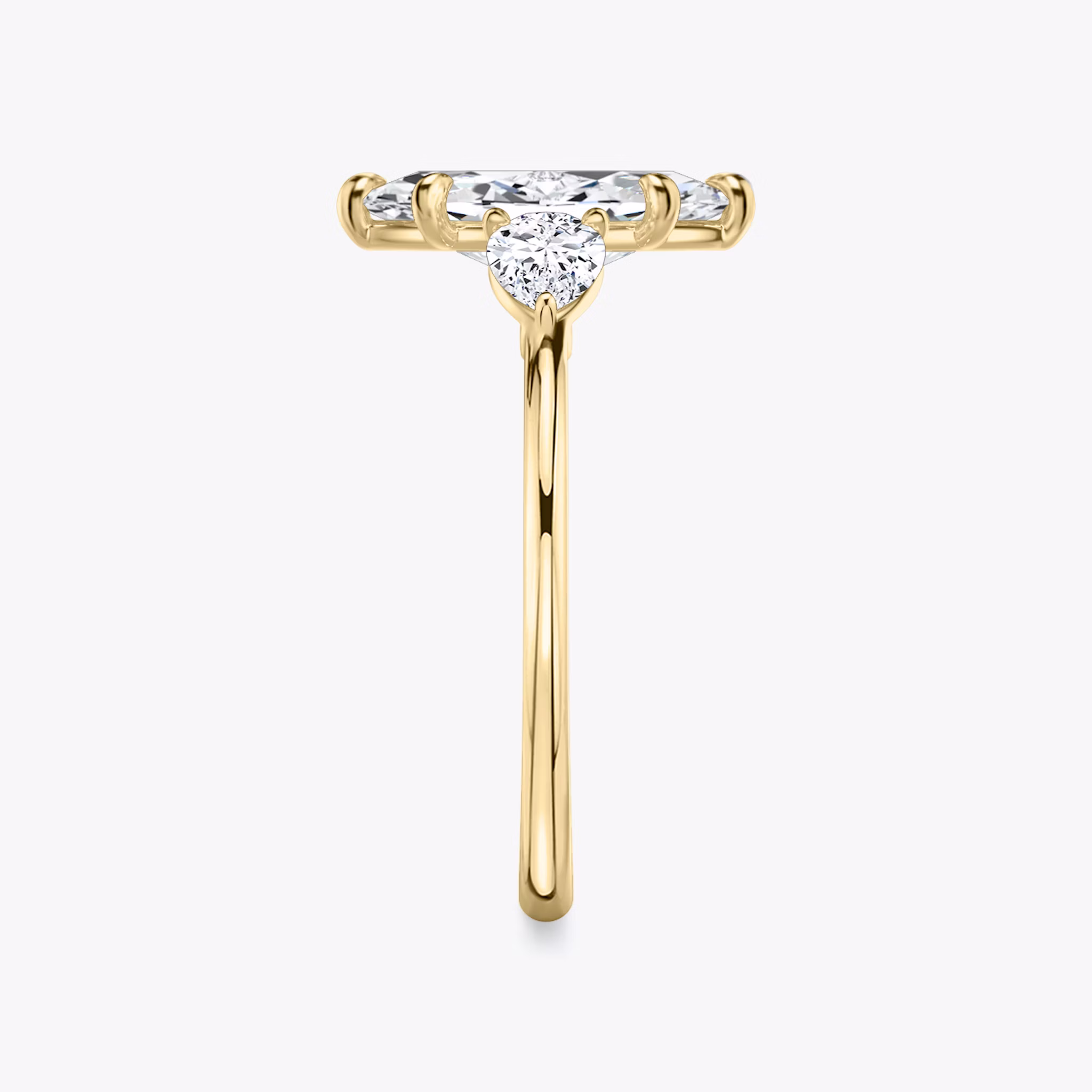 The Three Stone | Marquise | 18k | Yellow Gold | bandAccent: Plain | sideStoneCarat: 0.25ct | sideStoneShape: Pear | diamondOrientation: vertical | caratWeight: other
