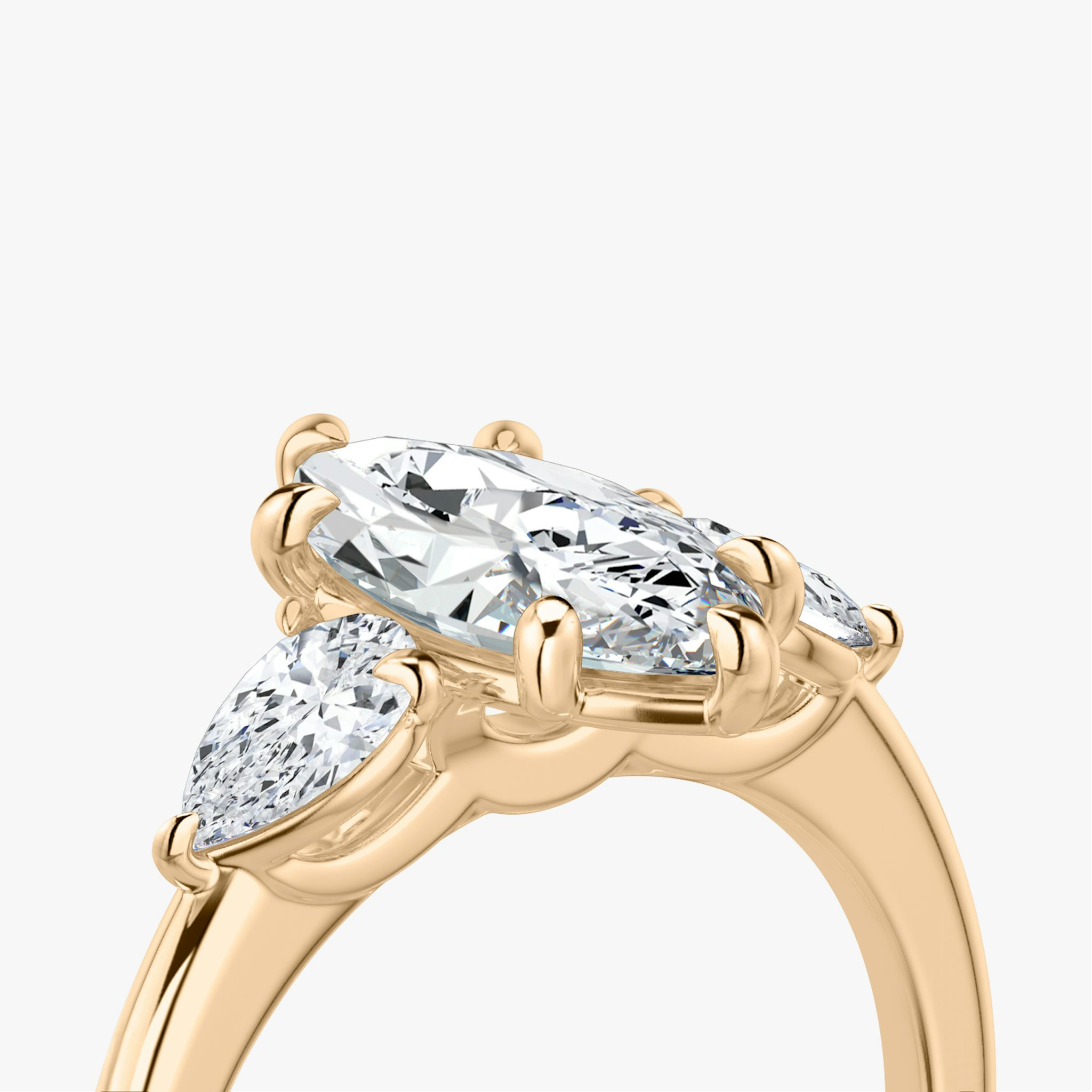 The Three Stone | Marquise | 14k | Rose Gold | bandAccent: Plain | sideStoneCarat: 0.25ct | sideStoneShape: Pear | diamondOrientation: vertical | caratWeight: other