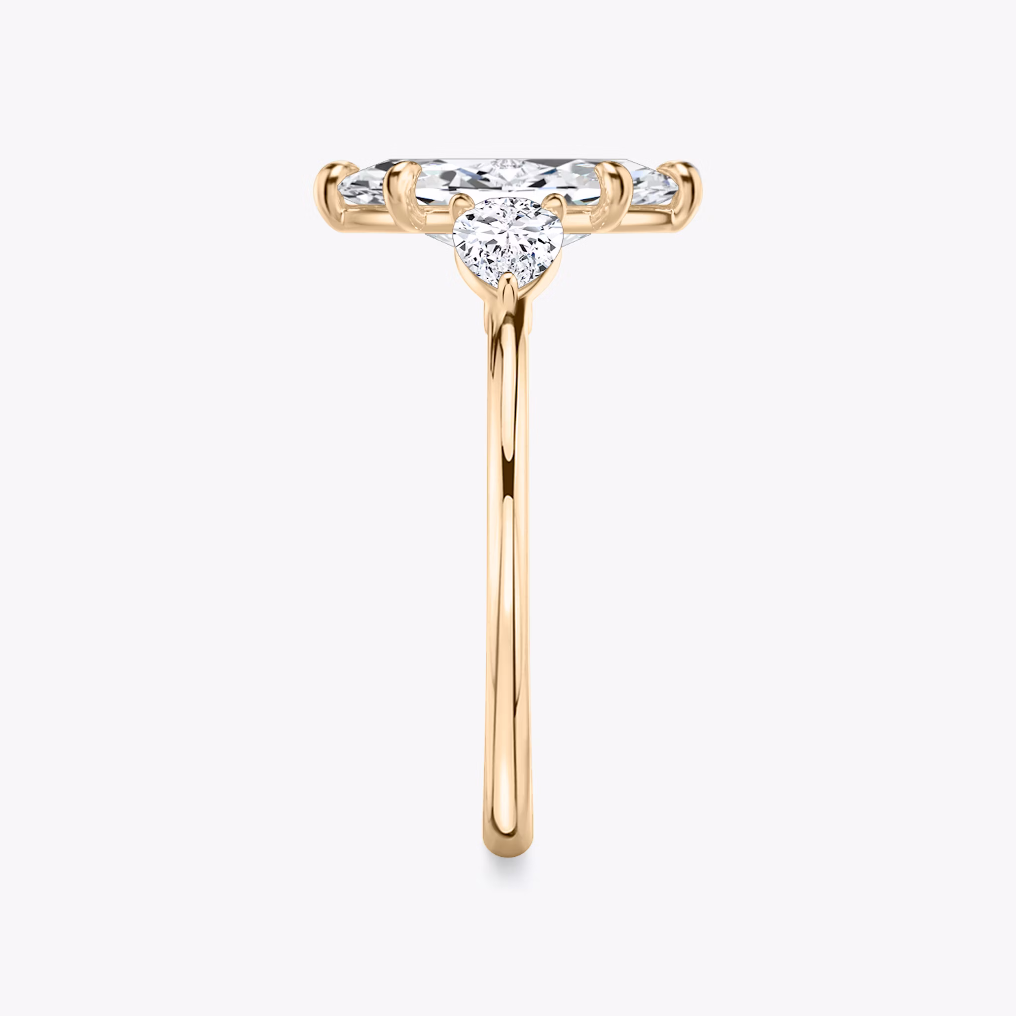 The Three Stone | Marquise | 14k | Rose Gold | bandAccent: Plain | sideStoneCarat: 0.25ct | sideStoneShape: Pear | diamondOrientation: vertical | caratWeight: other