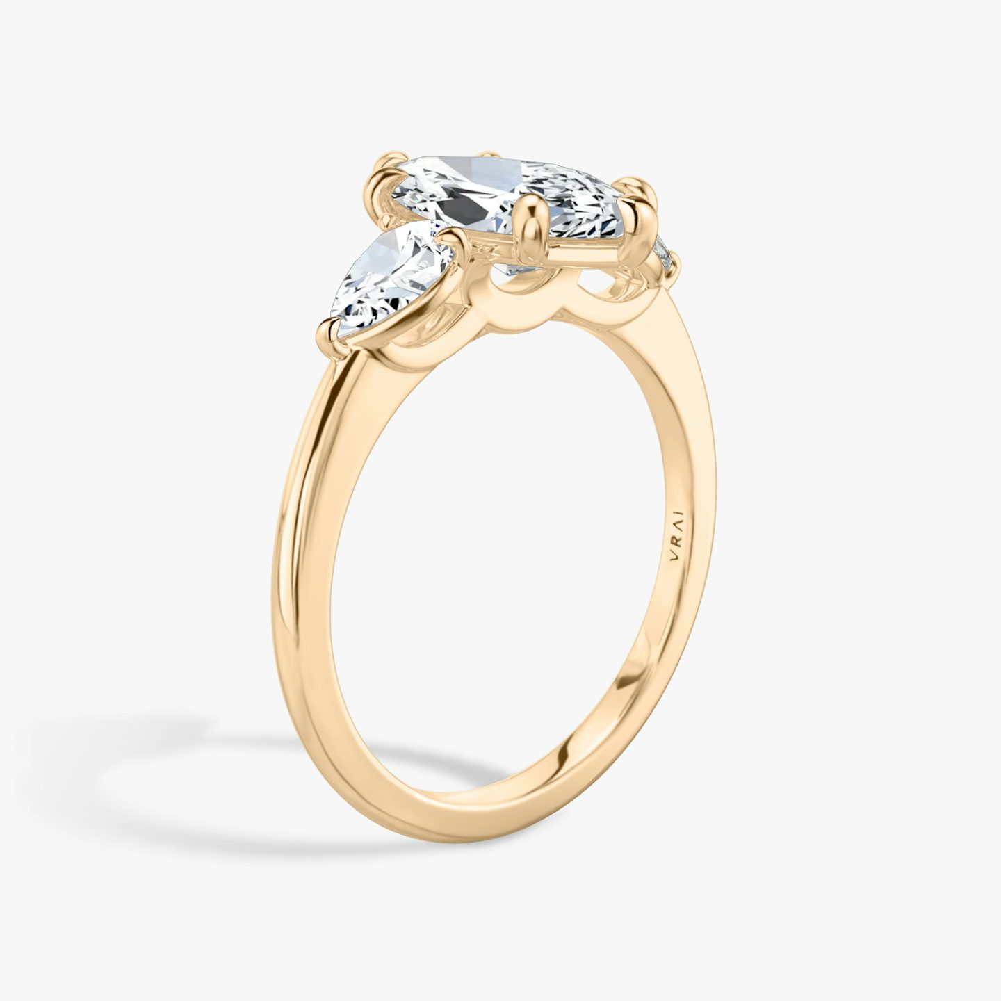 The Three Stone | Marquise | 14k | Rose Gold | bandAccent: Plain | sideStoneCarat: 0.25ct | sideStoneShape: Pear | diamondOrientation: vertical | caratWeight: other