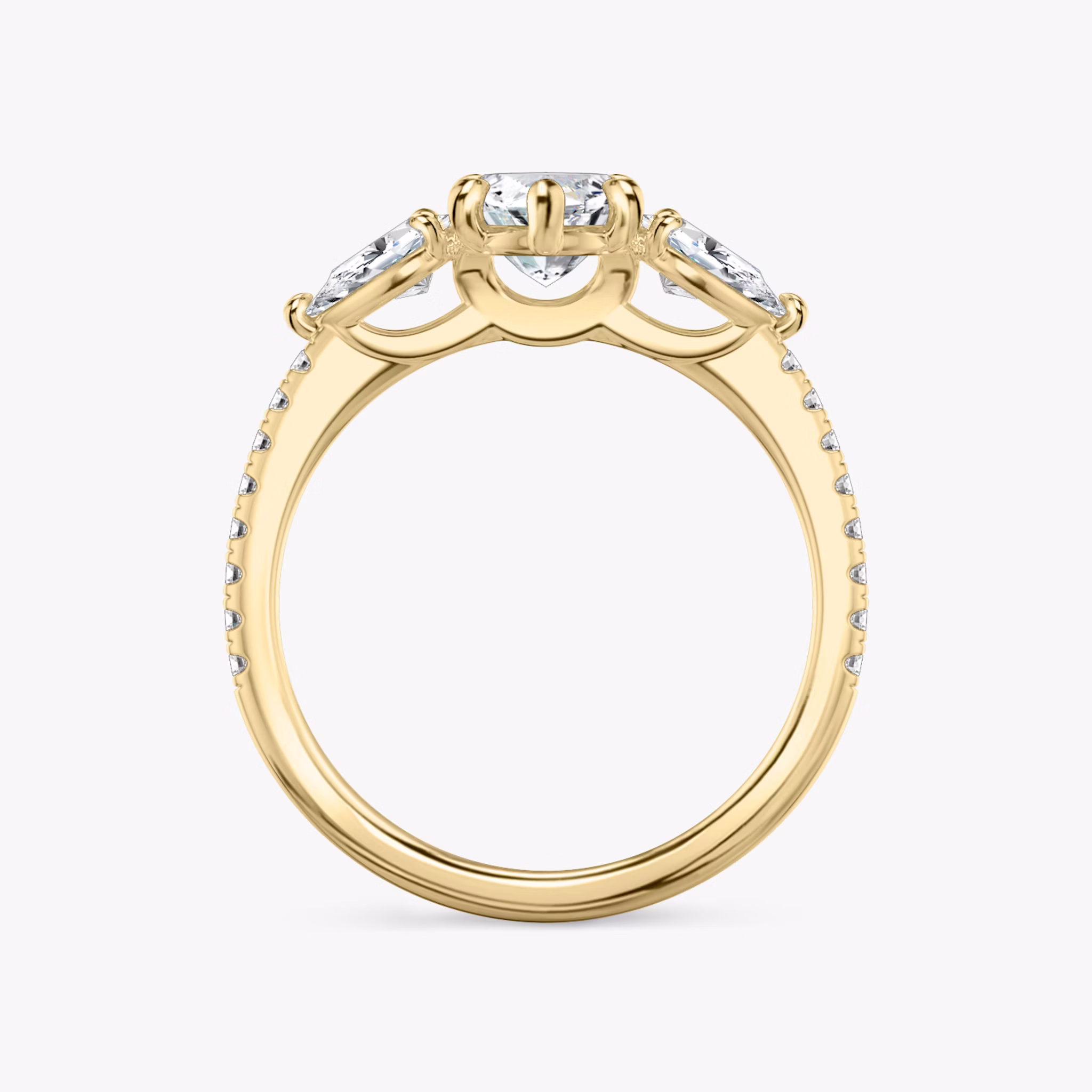 The Three Stone | Marquise | 18k | Yellow Gold | bandAccent: Pavé | sideStoneCarat: 0.25ct | sideStoneShape: Pear | diamondOrientation: vertical | caratWeight: other