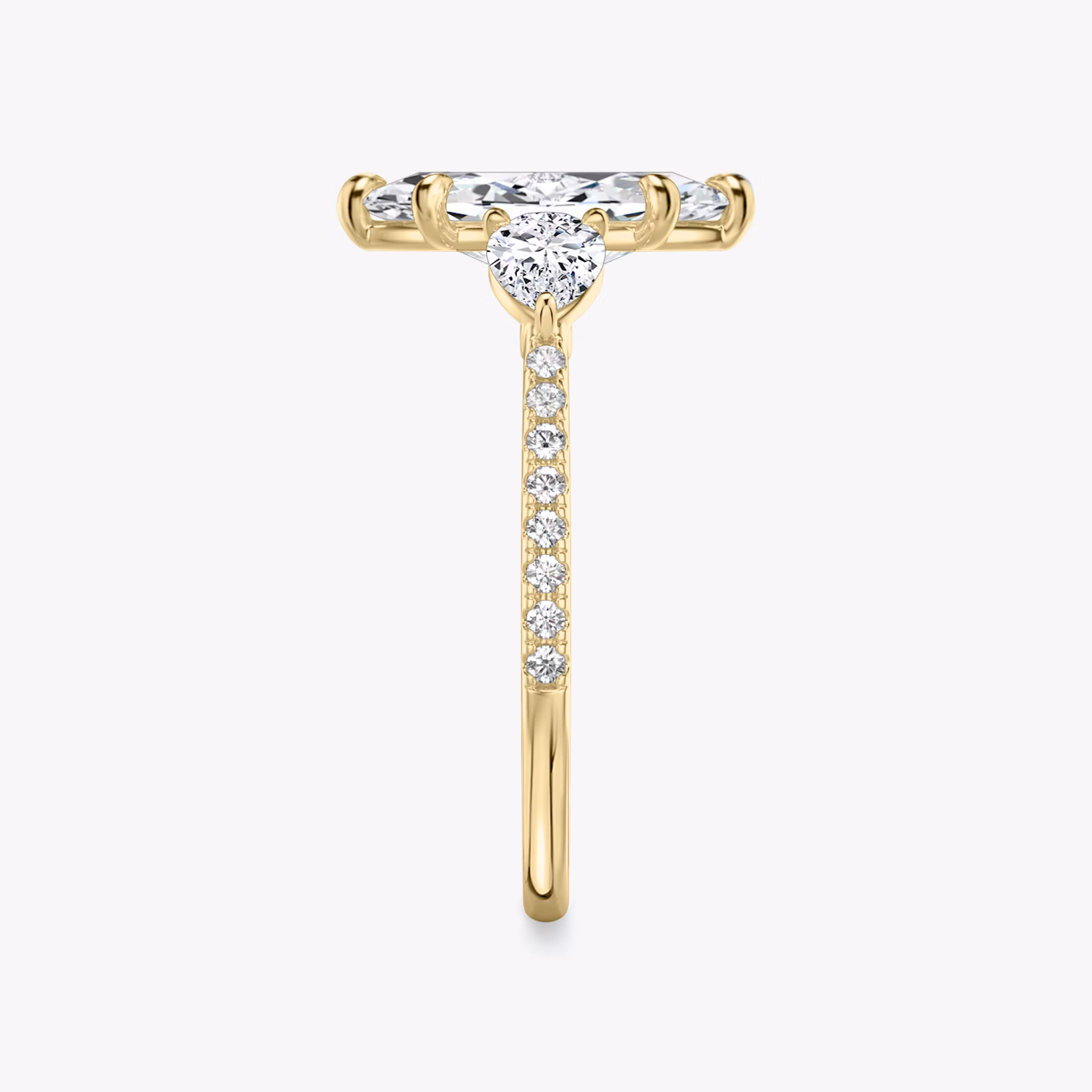 The Three Stone | Marquise | 18k | Yellow Gold | bandAccent: Pavé | sideStoneCarat: 0.25ct | sideStoneShape: Pear | diamondOrientation: vertical | caratWeight: other