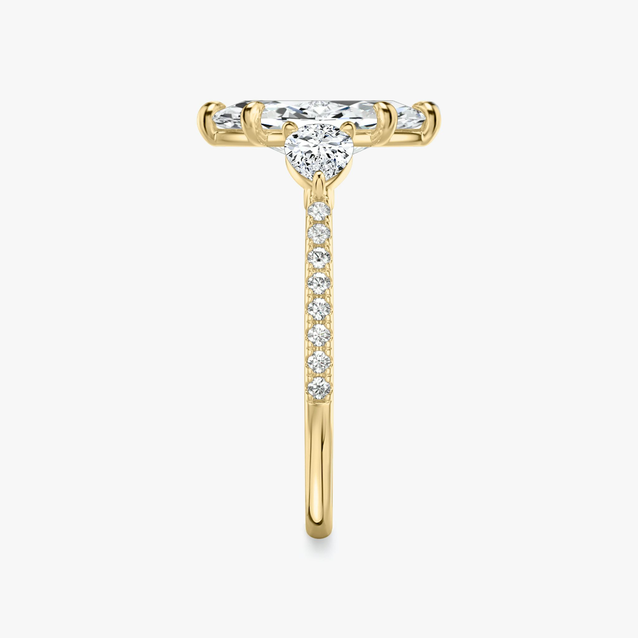 The Three Stone | Marquise | 18k | Yellow Gold | bandAccent: Pavé | sideStoneCarat: 0.25ct | sideStoneShape: Pear | diamondOrientation: vertical | caratWeight: other