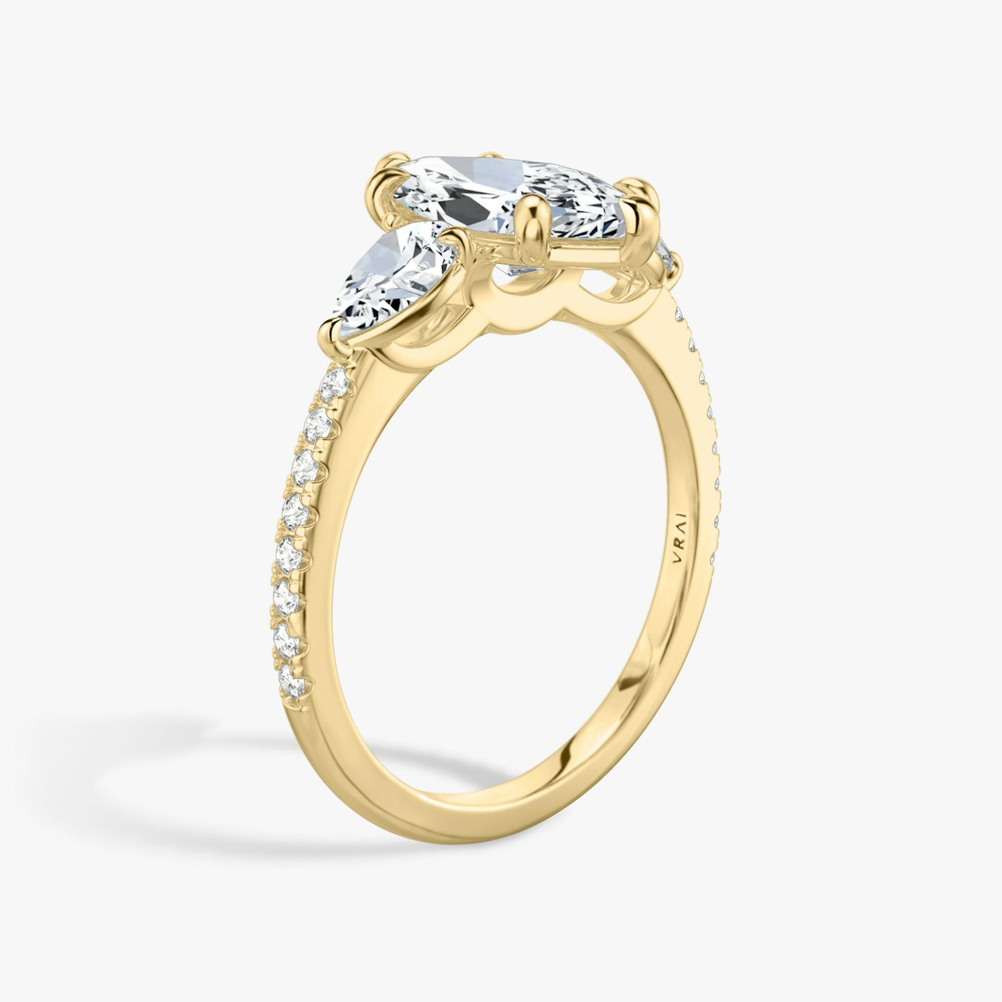 The Three Stone | Marquise | 18k | Yellow Gold | bandAccent: Pavé | sideStoneCarat: 0.25ct | sideStoneShape: Pear | diamondOrientation: vertical | caratWeight: other