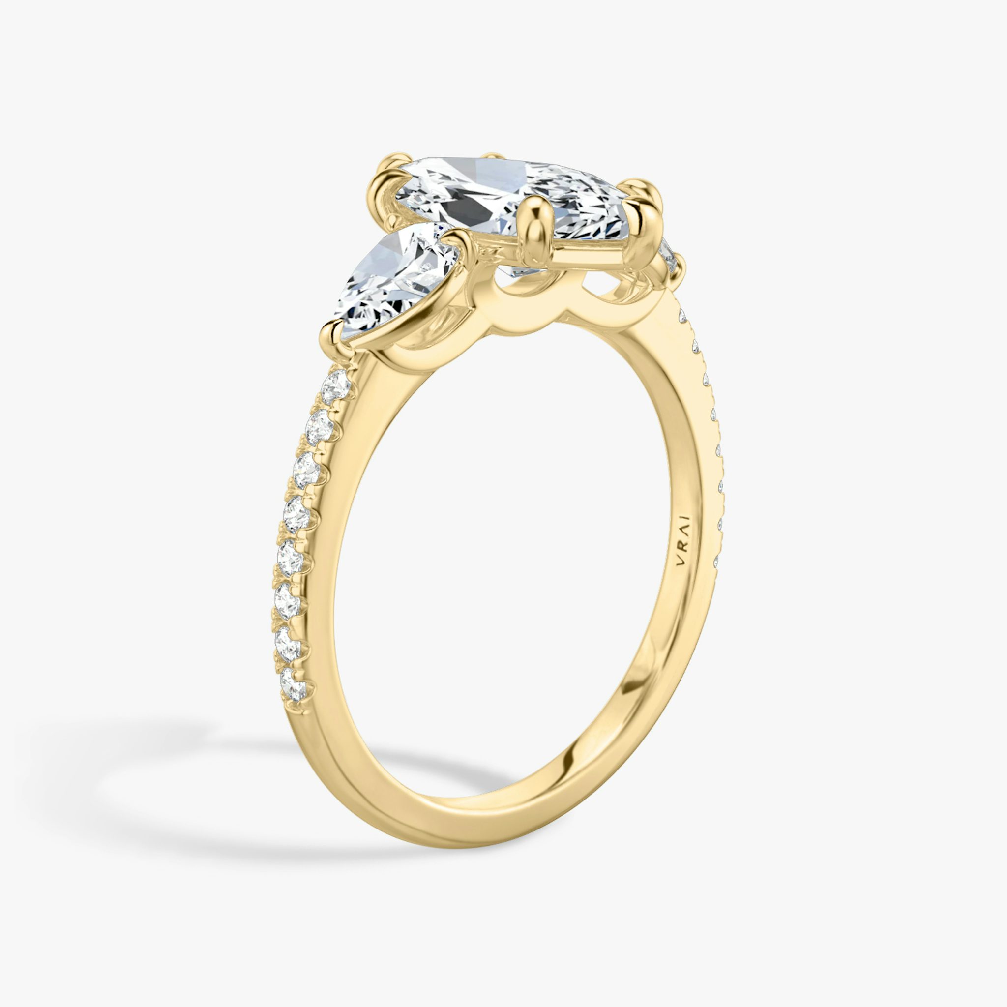 The Three Stone | Marquise | 18k | Yellow Gold | bandAccent: Pavé | sideStoneCarat: 0.25ct | sideStoneShape: Pear | diamondOrientation: vertical | caratWeight: other