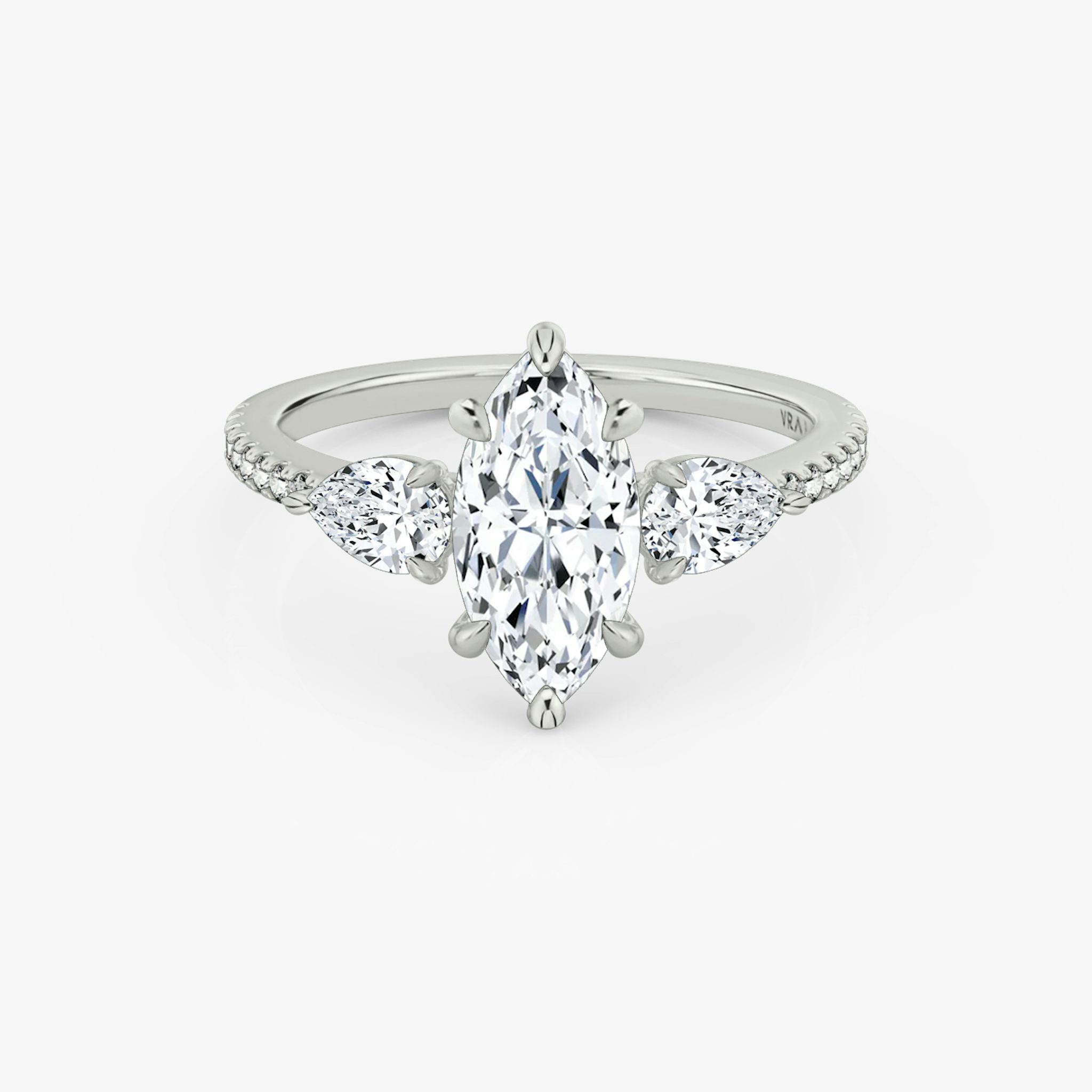 The Three Stone | Marquise | 18k | White Gold | bandAccent: Pavé | sideStoneCarat: 0.25ct | sideStoneShape: Pear | diamondOrientation: vertical | caratWeight: other