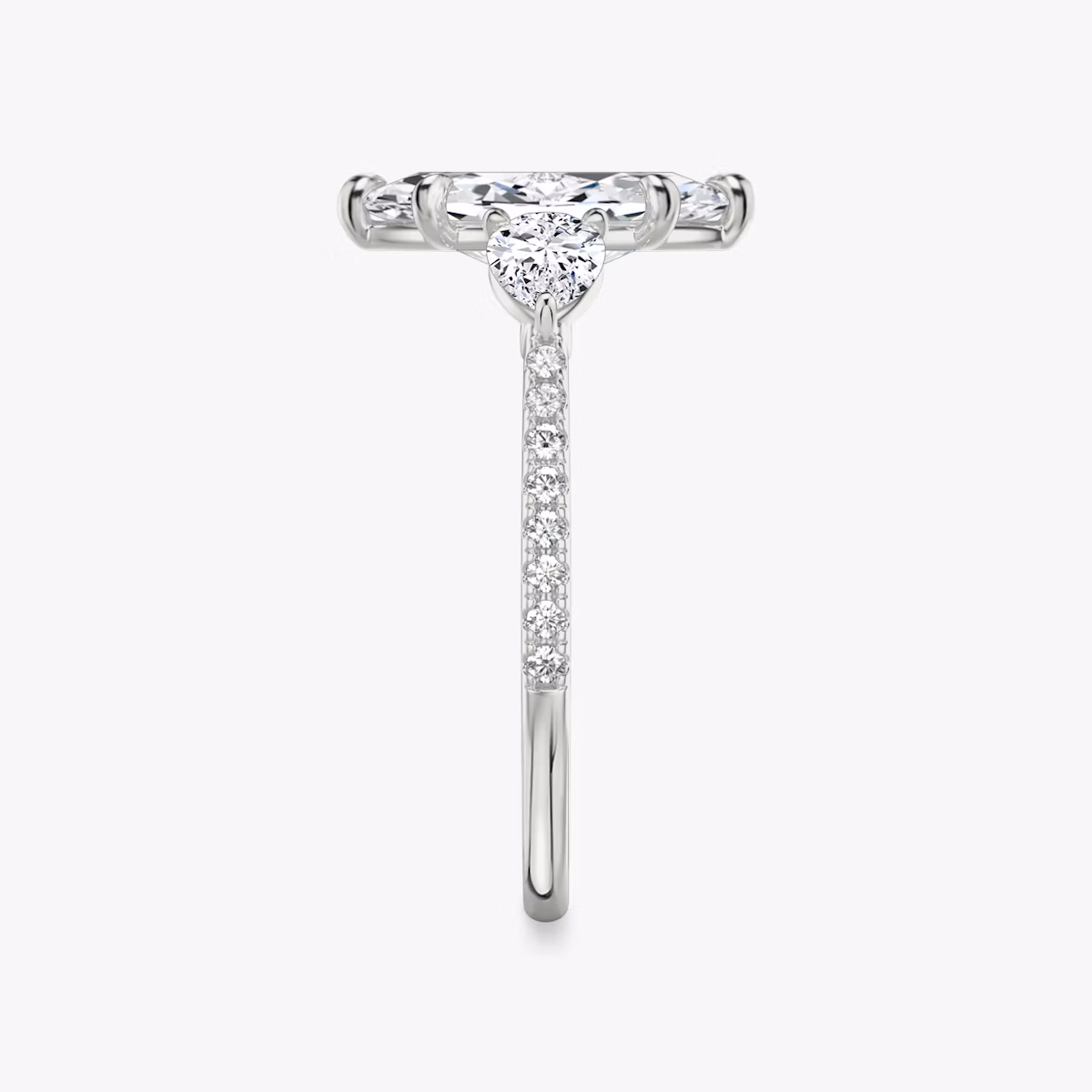 The Three Stone | Marquise | Platinum | bandAccent: Pavé | sideStoneCarat: 0.25ct | sideStoneShape: Pear | diamondOrientation: vertical | caratWeight: other