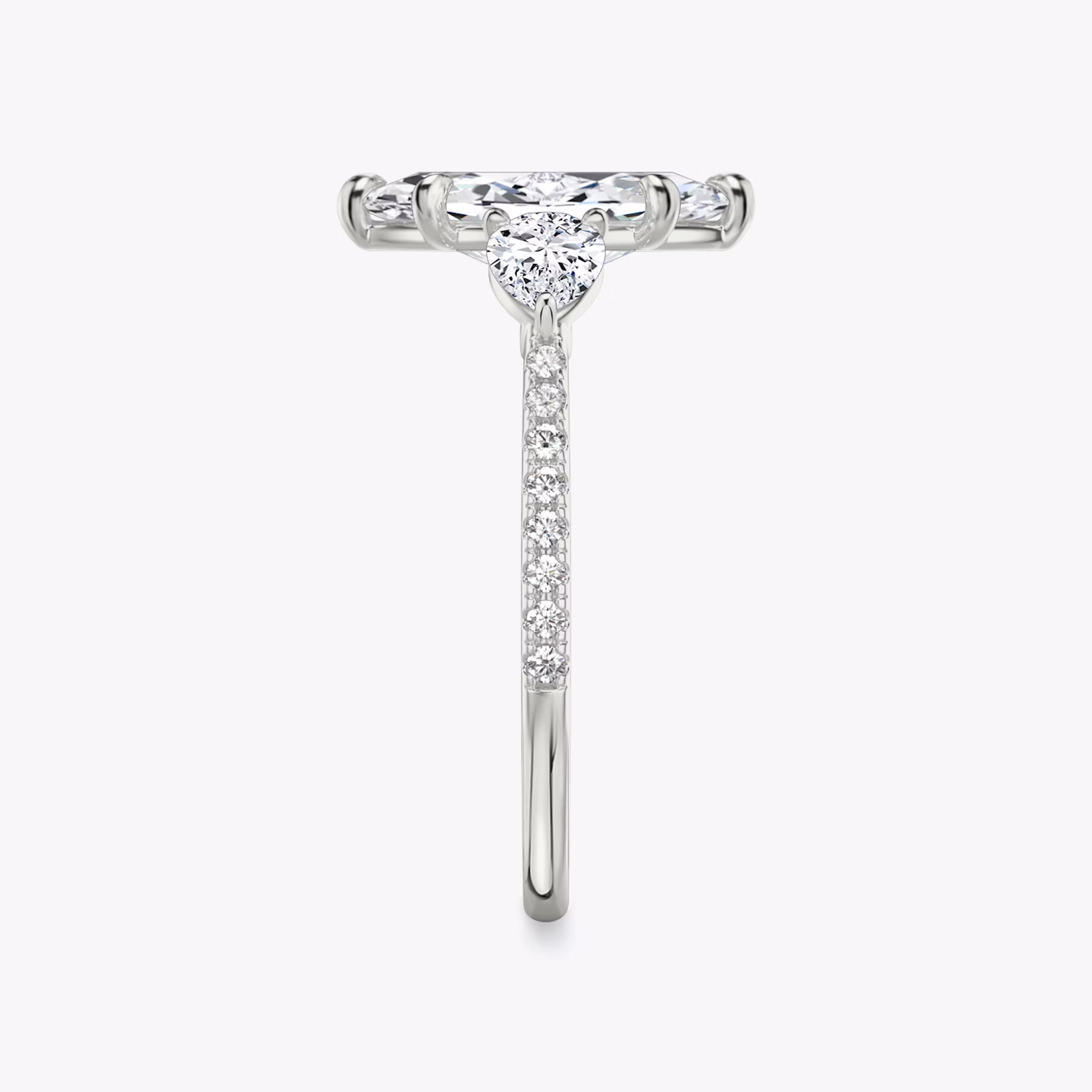 The Three Stone | Marquise | 18k | White Gold | bandAccent: Pavé | sideStoneCarat: 0.25ct | sideStoneShape: Pear | diamondOrientation: vertical | caratWeight: other