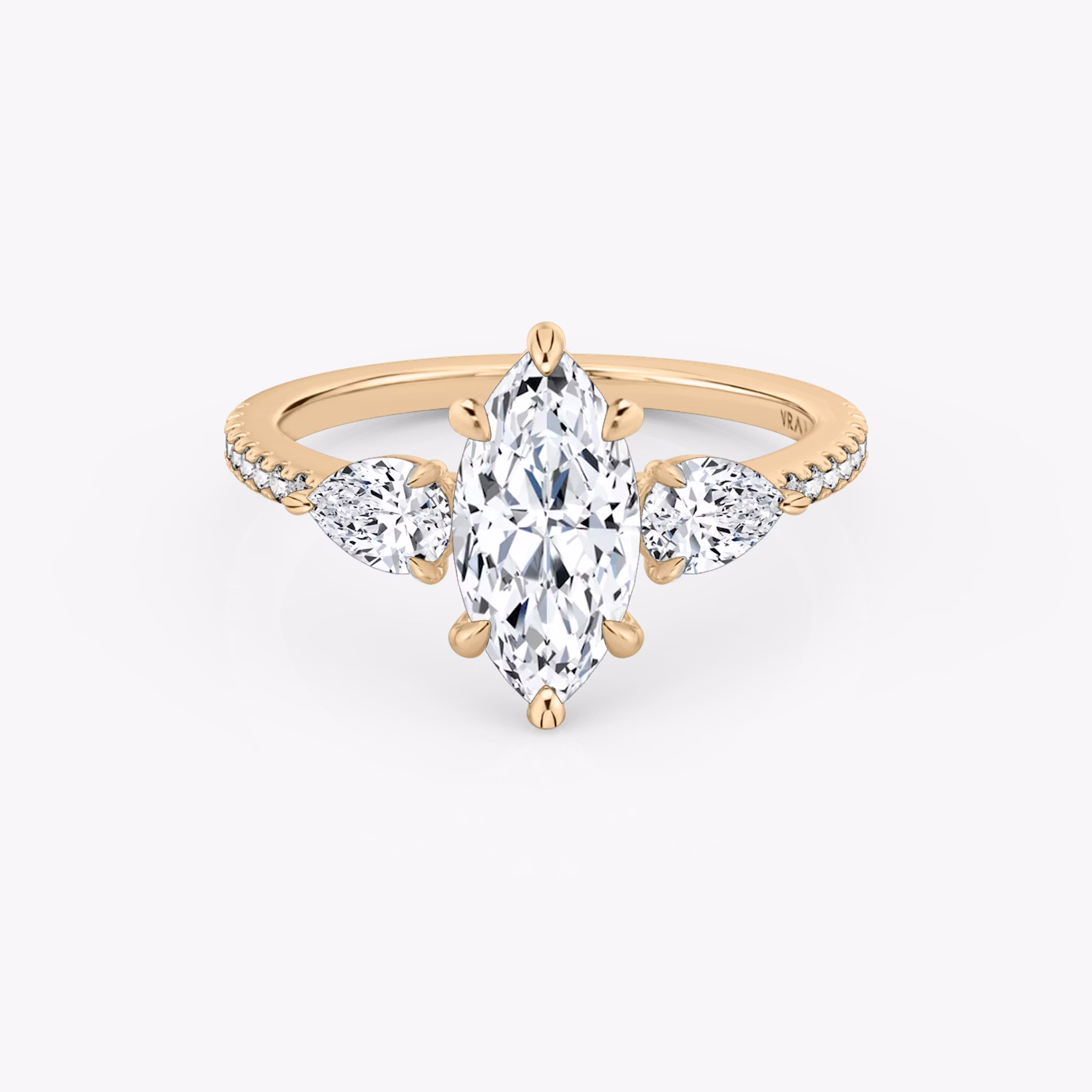 The Three Stone | Marquise | 14k | Rose Gold | bandAccent: Pavé | sideStoneCarat: 0.25ct | sideStoneShape: Pear | diamondOrientation: vertical | caratWeight: other