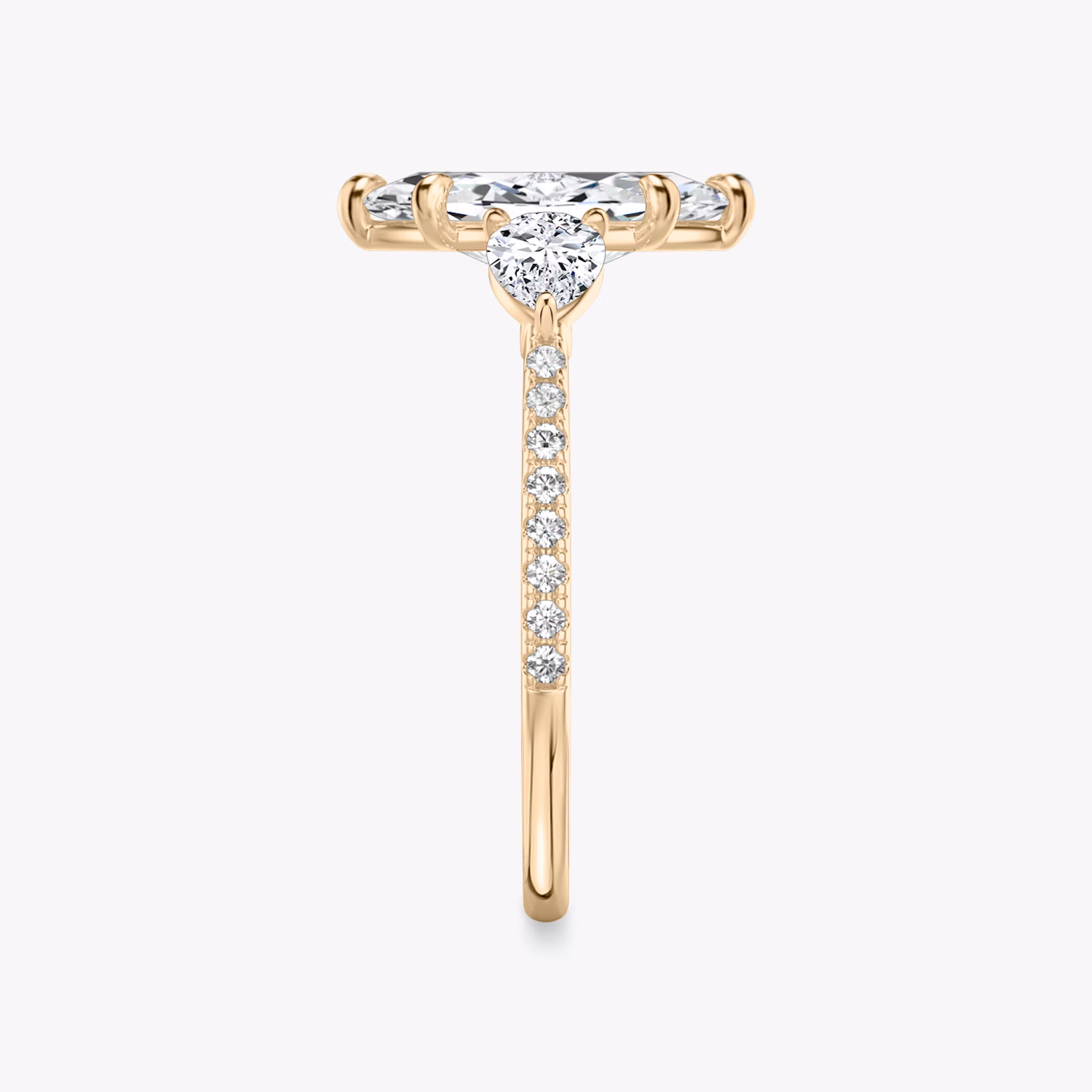 The Three Stone | Marquise | 14k | Rose Gold | bandAccent: Pavé | sideStoneCarat: 0.25ct | sideStoneShape: Pear | diamondOrientation: vertical | caratWeight: other