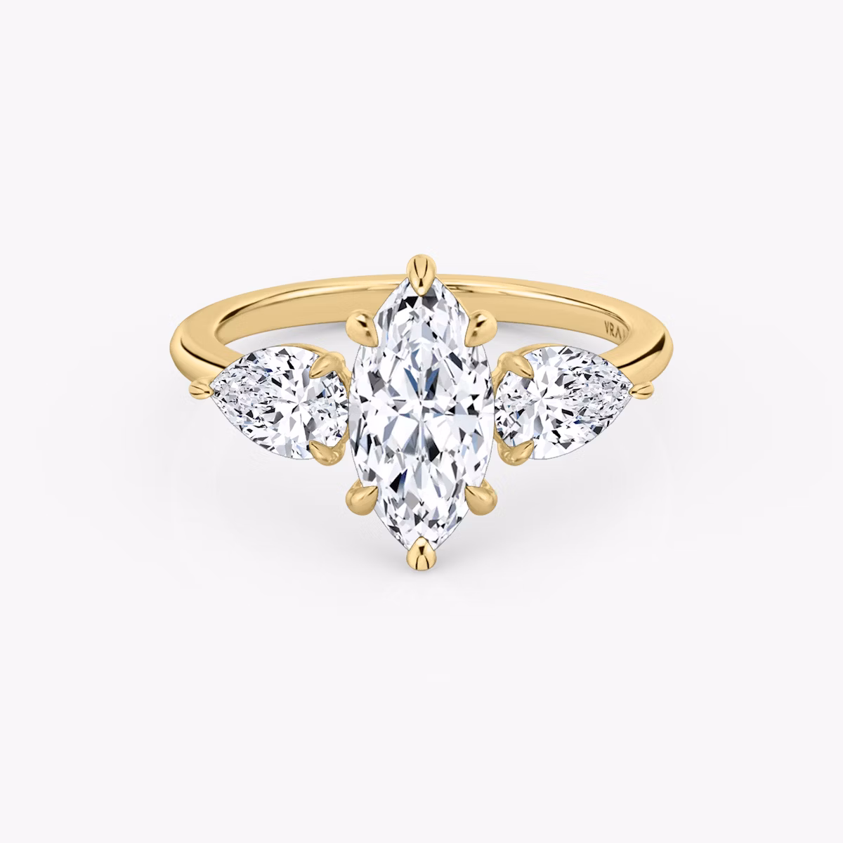 Three Stone | Marquise | 18k | Gelbgold | bandAccent: Ohne Pavé-Besatz | sideStoneCarat: 0.50ct | sideStoneShape: Tropfen | diamondOrientation: vertical | caratWeight: other