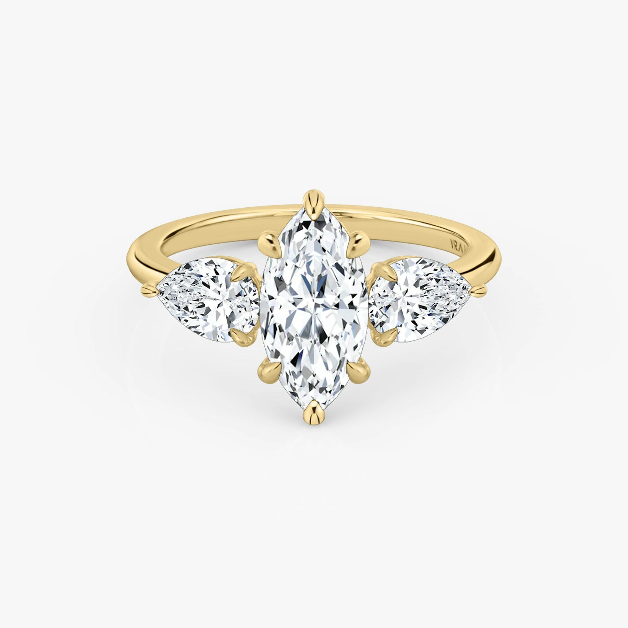 The Three Stone | Marquise | 18k | Yellow Gold | bandAccent: Plain | sideStoneCarat: 0.50ct | sideStoneShape: Pear | diamondOrientation: vertical | caratWeight: other