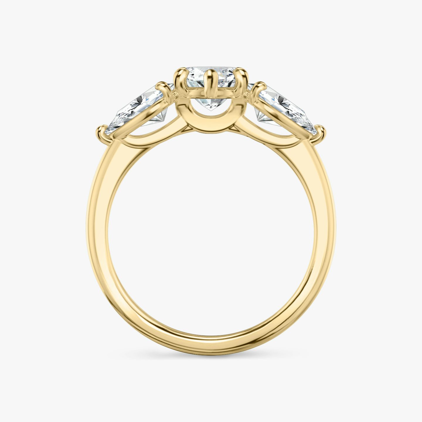 Anillo de compromiso Three Stone | Marquise | 18k | Oro amarillo | bandAccent: Simple | sideStoneCarat: 0.50ct | sideStoneShape: Pera | diamondOrientation: vertical | caratWeight: other