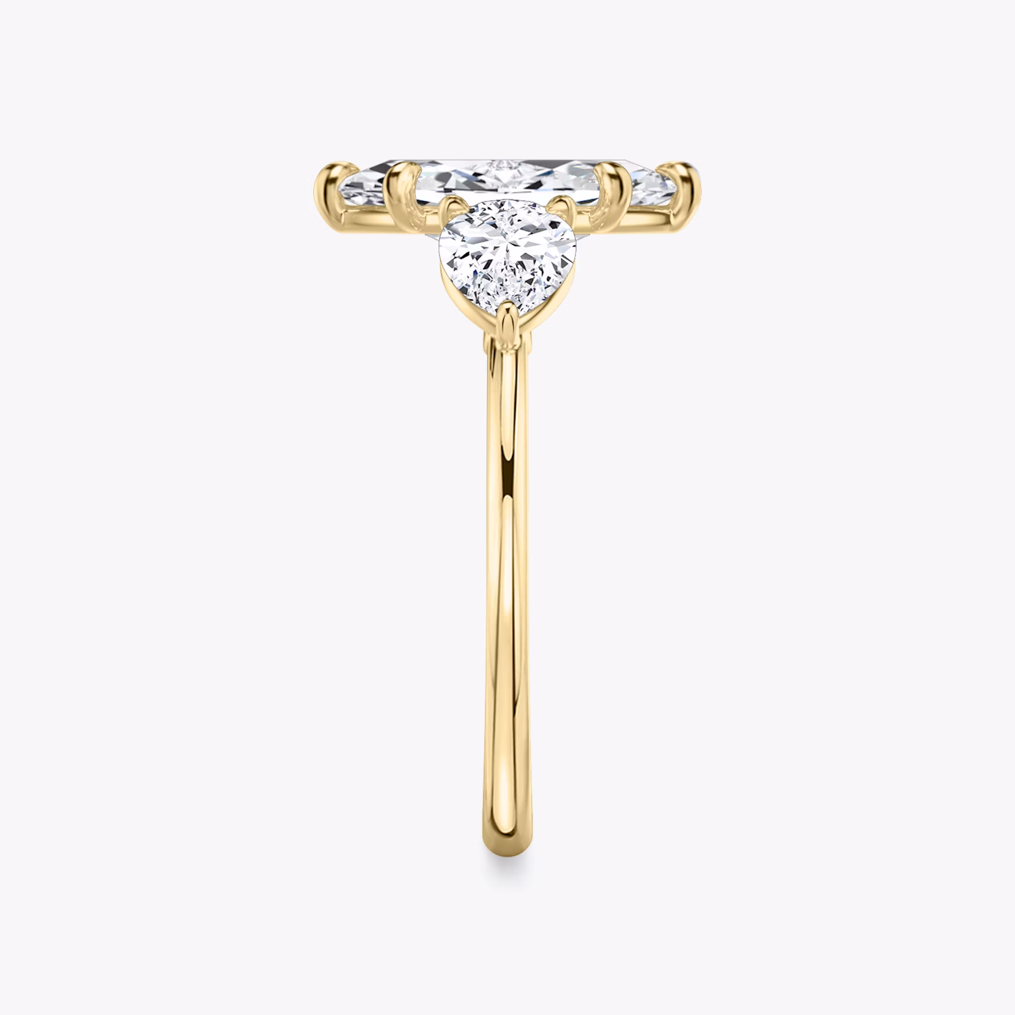 The Three Stone | Marquise | 18k | Yellow Gold | bandAccent: Plain | sideStoneCarat: 0.50ct | sideStoneShape: Pear | diamondOrientation: vertical | caratWeight: other