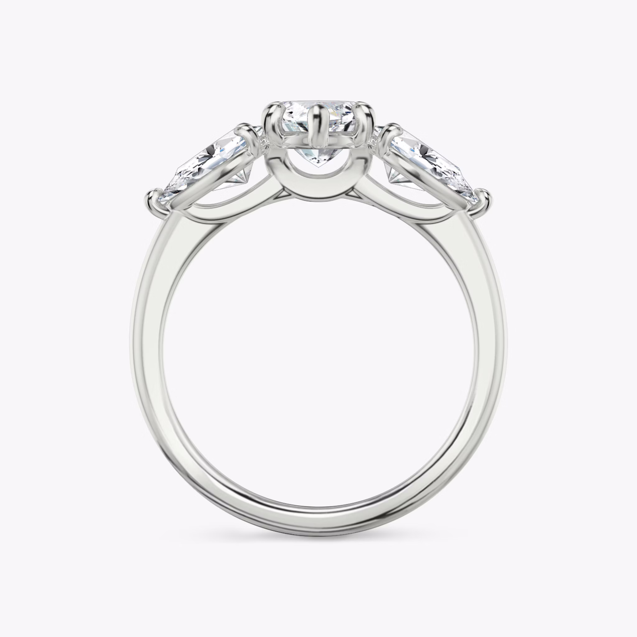 The Three Stone | Marquise | 18k | White Gold | bandAccent: Plain | sideStoneCarat: 0.50ct | sideStoneShape: Pear | diamondOrientation: vertical | caratWeight: other